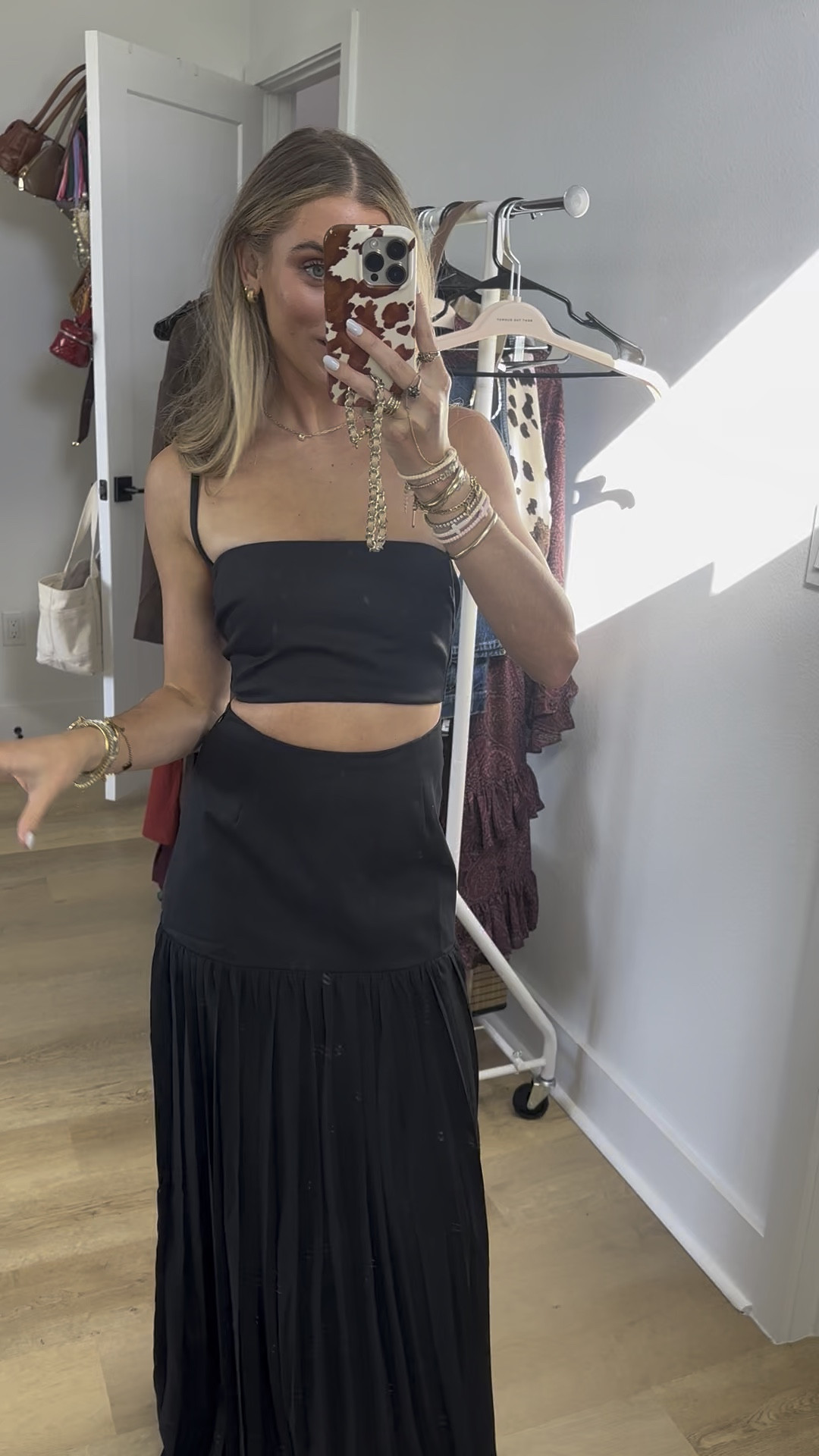 Showpo size 2. This black two-piece brings instant polish with a square-neck crop and high-waist pleated mini that snatches the waist and shows off legs. A co-ord skirts moment that moves from brunch to bar, it nails the clean-girl aesthetic while leaning into the Naked dressing vibe with skin-baring proportions, just add an Oversized shirt thrown over the top for a chill layer and you’re golden.
Rowan Two Piece Set makes dressing easy: the crop balances the structured pleats, while the high-rise fit flatters and elongates. Style it up with chunky charm bracelets and Y2K sunglasses for that trending finish, or keep it minimal and monochrome for a sleek after-dark look. Search-friendly and street-ready, this is the black set you’ll reach for on repeat.

#LTKHoliday #LTKFindsUnder100 #LTKStyleTip