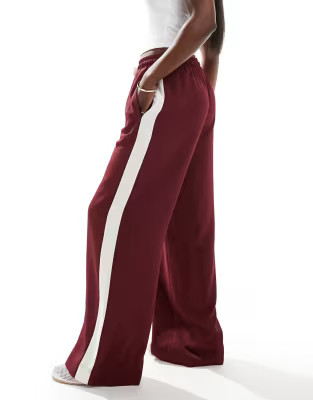 ASOS DESIGN pull on pants with contrast panel in burgundy | ASOS (Global)