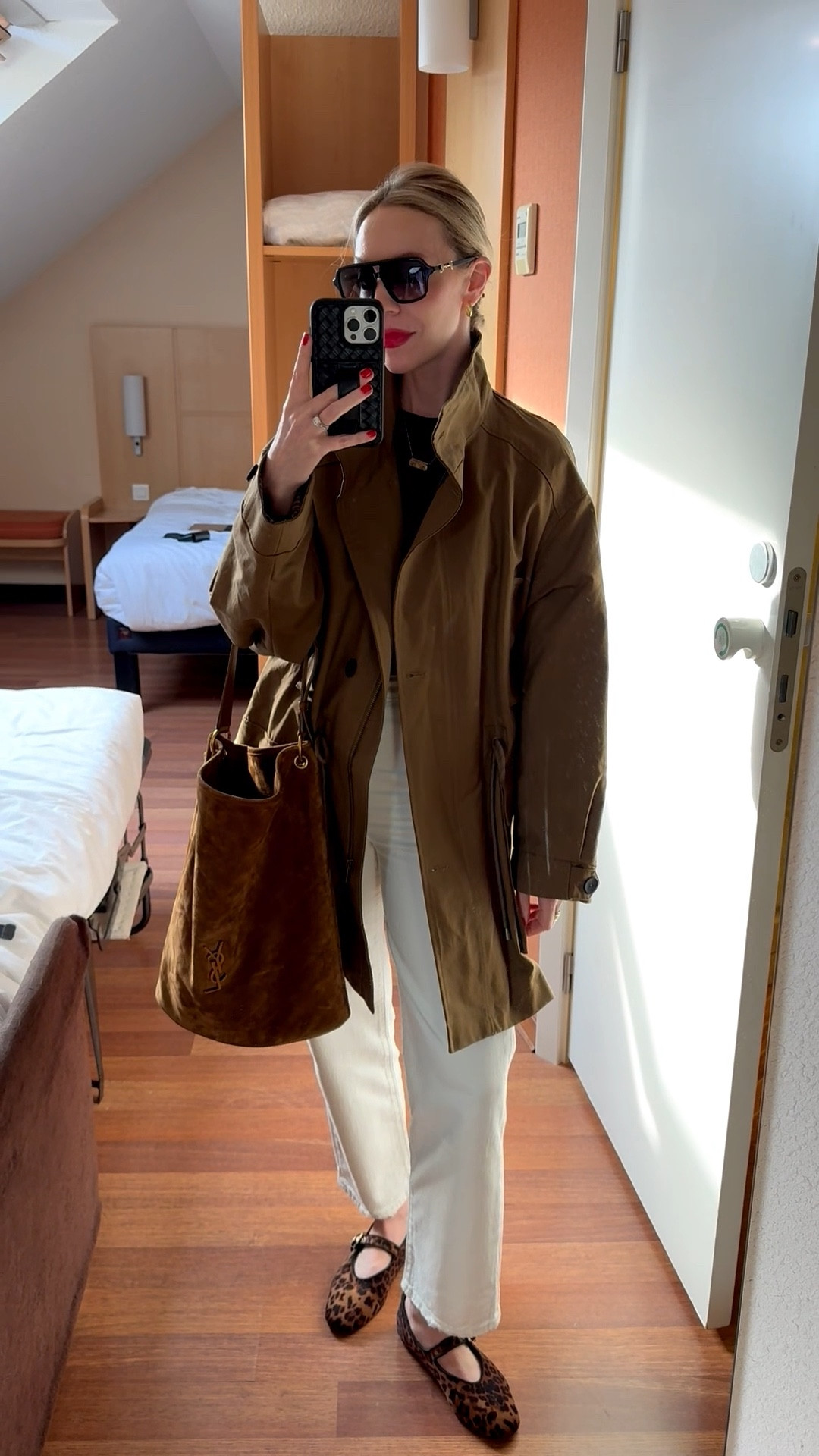 Spring outfit idea with black tee and white jeans, @Zara utility jacket, leopard print ballet flats, suede YSL bucket bag

#LTKTravel #LTKOver40 #LTKootd