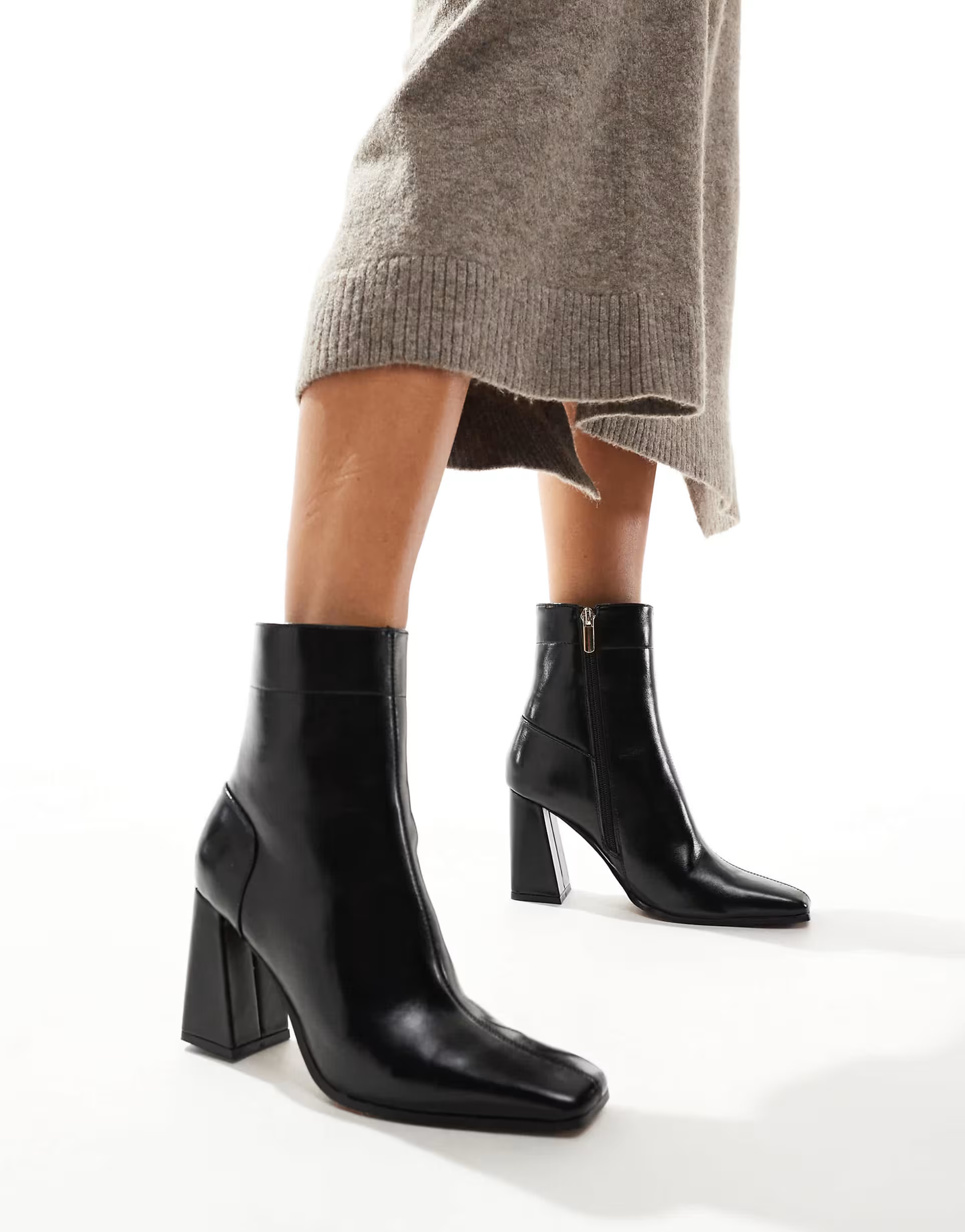 ASOS DESIGN Wide Fit Everest flared heel boots in black | ASOS (Global)