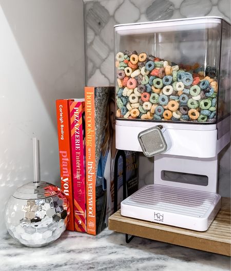 First favorite purchase of 2023 goes out to this dry food/cereal dispenser! Maybe now the boys will be able to do it theirselves 🤣 #pantryrefresh #kitchenstorage #organization #kitchenorganization #homedecor 

#LTKfamily #LTKFind #LTKhome