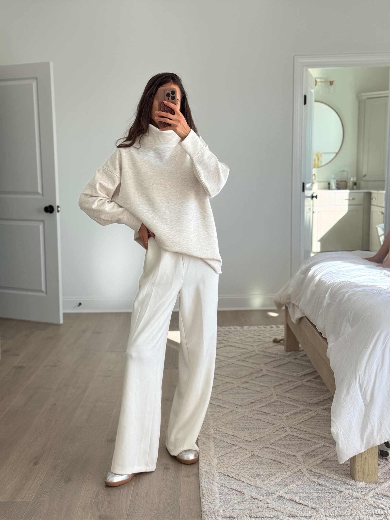 Neutral monochrome outfit with an oversized cozy sweater and relaxed wide leg pants. Soft, comfortable pieces that feel elevated but still easy for everyday wear. Perfect casual outfit for errands, travel days, casual meetings, or lounging in style. Neutral outfit ideas, monochrome outfit, wide leg pants, oversized sweater, casual chic outfit, everyday comfortable wear, minimalist style, relaxed fit clothing.

#LTKSeasonal #LTKootd #LTKFindsUnder50
