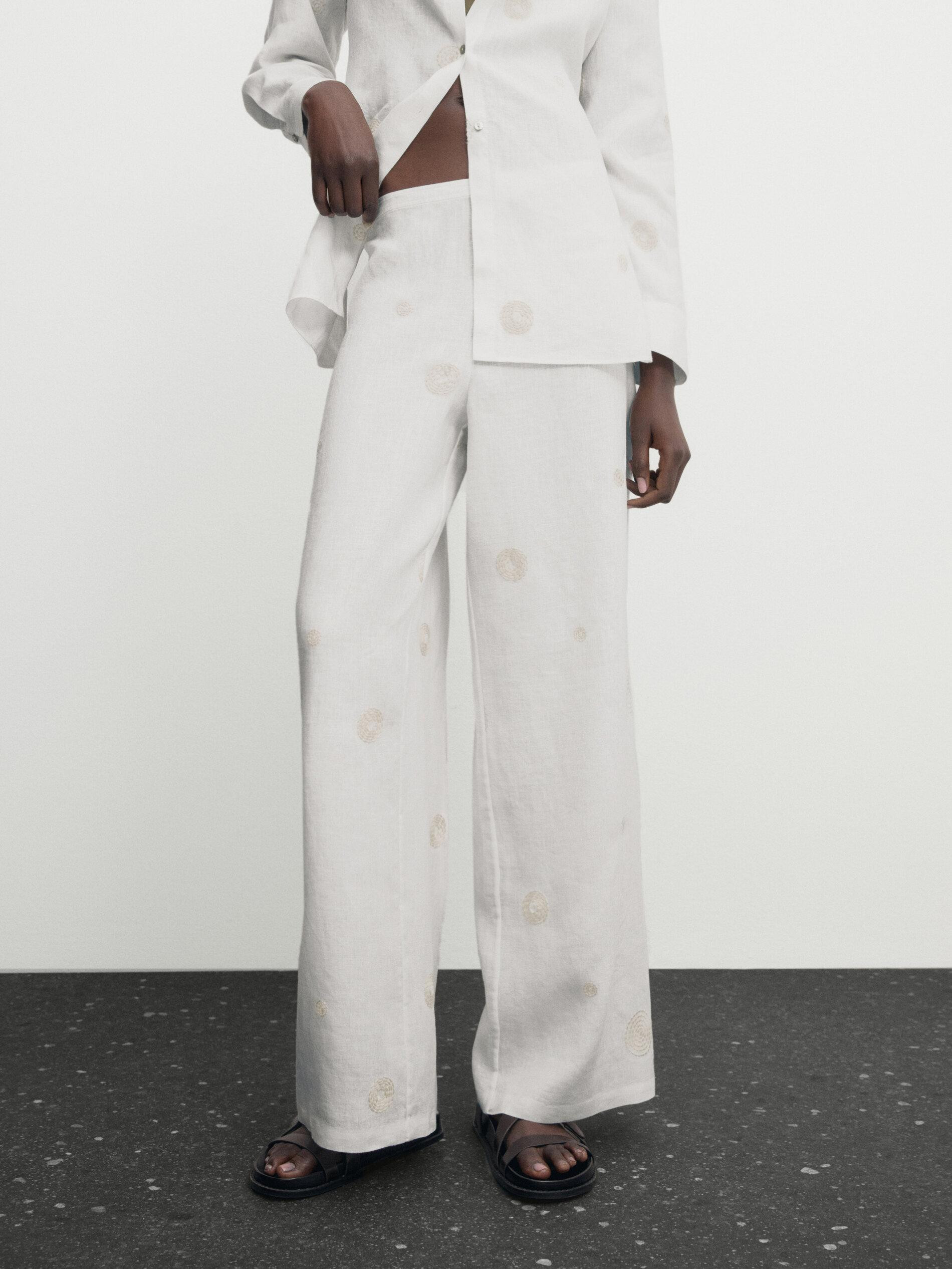 Straight trousers with an embroidery detail | Massimo Dutti US