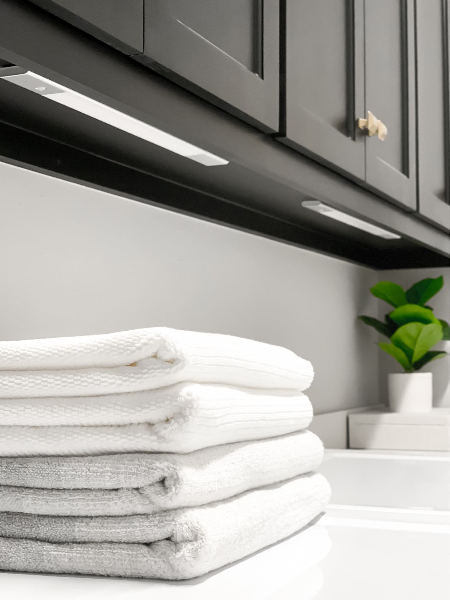 Motion sensor under cabinet lights. They’re battery powered and dimmable. Also easy to install. The lights come with a metal magnetic strip with double sided tape for the wall. The magnet part holds the lamp in place and makes taking it off easy.

Lighting, under cabinet lighting for kitchen, battery powered under cabinet lighting, laundry room, towels, Amazon finds, Amazon home, decor box, faux plant, fiddle leaf, white towels

#LTKstyletip #LTKhome #LTKFind