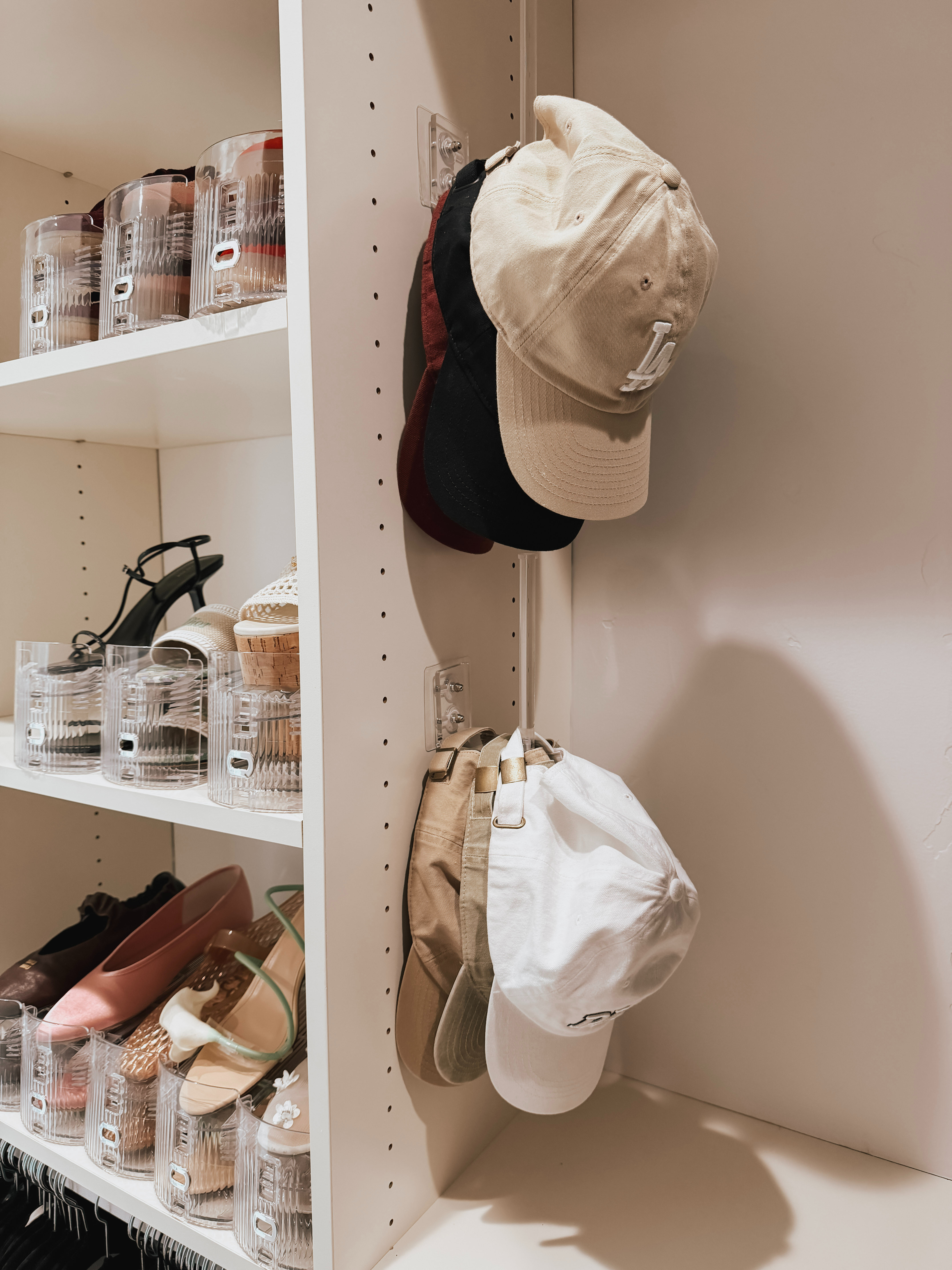 Such an easy way to keep hats organized without taking up shelf space. Just stick it inside your closet and stack your hats vertically so they’re easy to see and grab.
 

 #LTKHome