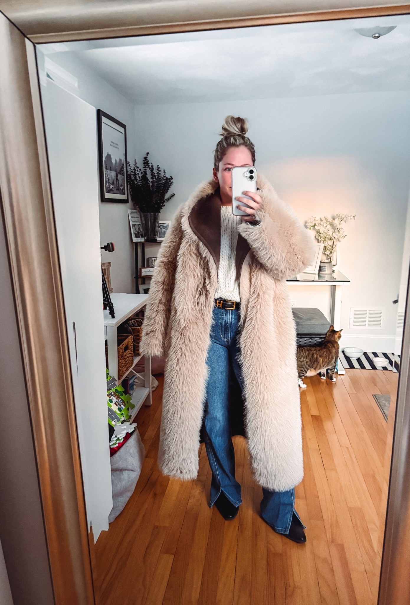 Date night look! Valentine’s Day outfit 
Casual brunch maxi length faux fur coat (reversible!!!) 
Joe twisted honey bootleg denim. (A little long on me) 
Designer inspired belt 
Soft sweater 

#LTKPetite #LTKootd #LTKValentine