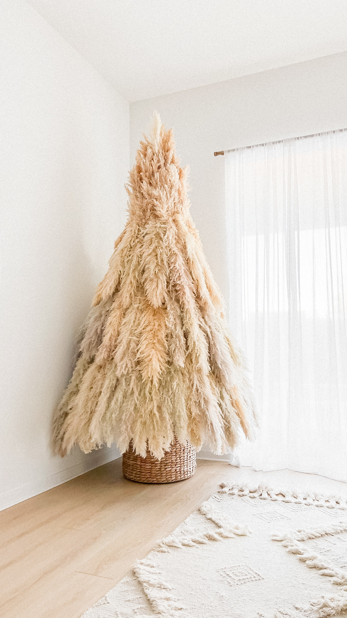 Love our DIY pampas Christmas tree from last year. Linked everything I used to create it + similars for oos items. Full tutorial on my blog: www.neutrallynicole.com/blog/pampas-christmas-tree

// DIY pampas grass tree, pampas grass tree, DIY pampas tree, pampas tree, boho tree, boho Christmas tree, boho holiday tree, boho pampas Christmas tree, boho pampas holiday tree, holiday tree, holiday decor, Christmas tree, Christmas decor, white tree, white Christmas tree, white faux tree, white faux Christmas tree, white faux holiday tree, faux holiday tree, faux Christmas tree, Amazon home, Amazon finds, Target, home decor, boho home decor, neutral home (10.31)

#liketkit #LTKsalealert #LTKhome #LTKfindsunder50 #LTKstyletip #LTKHoliday #LTKparties #LTKSeasonal #LTKfindsunder100