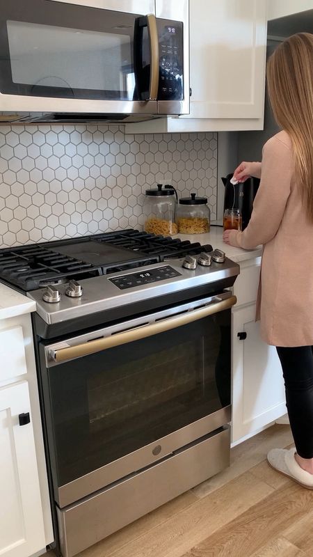 Visit my Instagram Reel to see what the sounds of this kettle remind me of every morning! 😅


Home decor, white kitchen, kitchen appliances, water kettle, kitchen accessories, glass storage containers, glass, fancy tea spoon, white square plate, beige long sweater, black leggings, cozy house shoes, nude knit jacket

#LTKhome #LTKstyletip