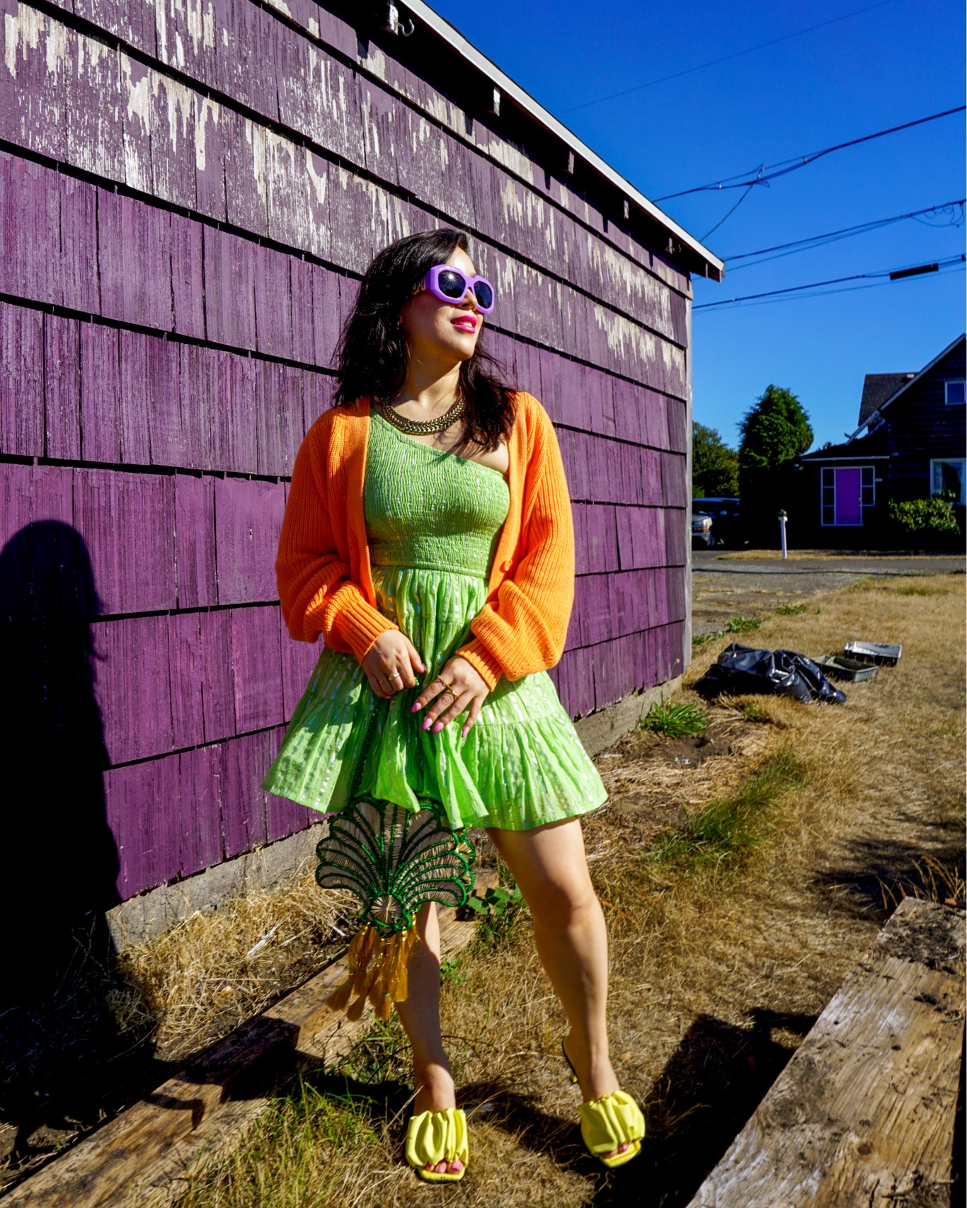 The perfect sundress paired with a sweater is the perfect transitional outfit as we move from summer to fall. 