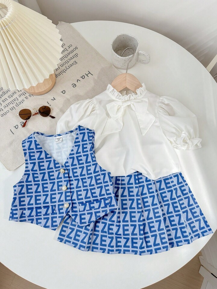 SHEIN Young Girl 3pcs/Set Metal Button Letter Print Vest, Stand Collar Shirt & Pleated Skirt Suit | SHEIN