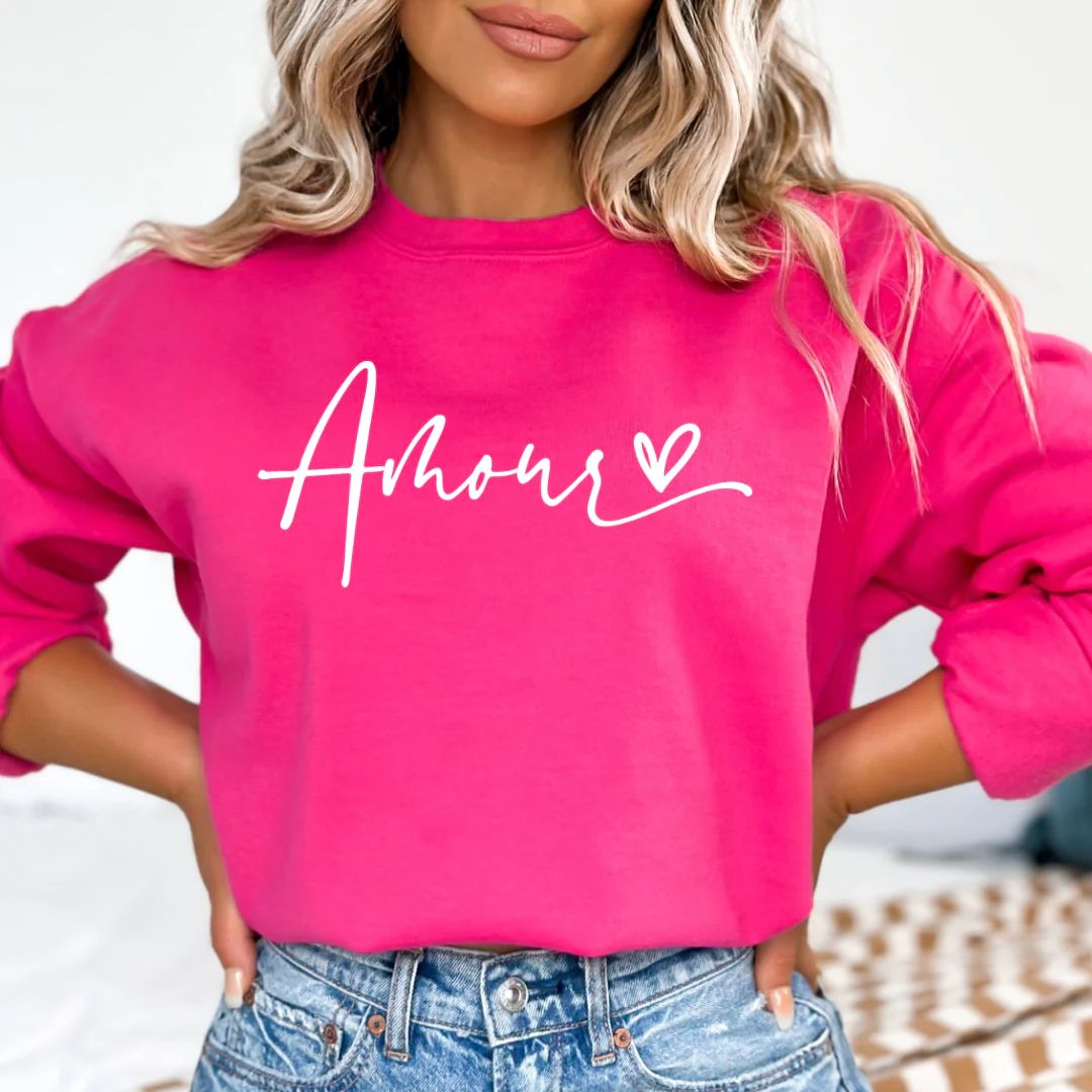 Amore CrewneckUpgrade your wardrobe with our Amore Crewneck sweater. M | Sweetest Dreams Style