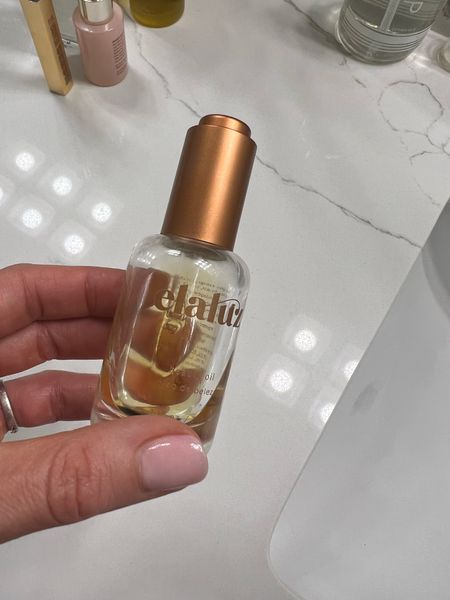 Beauty oil. I love the feel of this under my eyes in the morning to prep for concealer or before bed on my face and neck. I never need more than 3 drops at a time and it feels luxurious. Elaluz oil 

#LTKunder50 #LTKswim #LTKbeauty