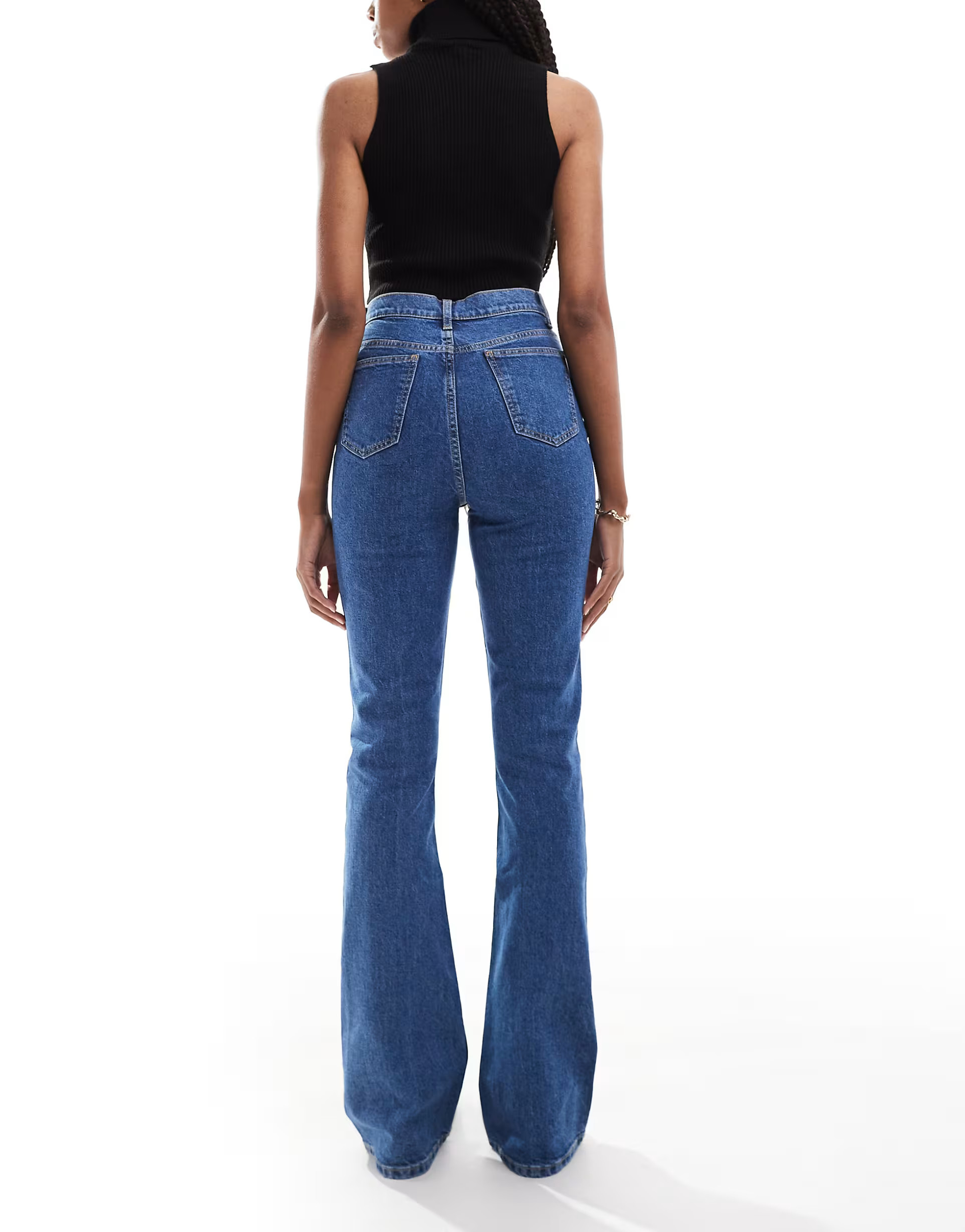 ASOS DESIGN Tall mid rise flare jeans in mid blue | ASOS | ASOS (Global)