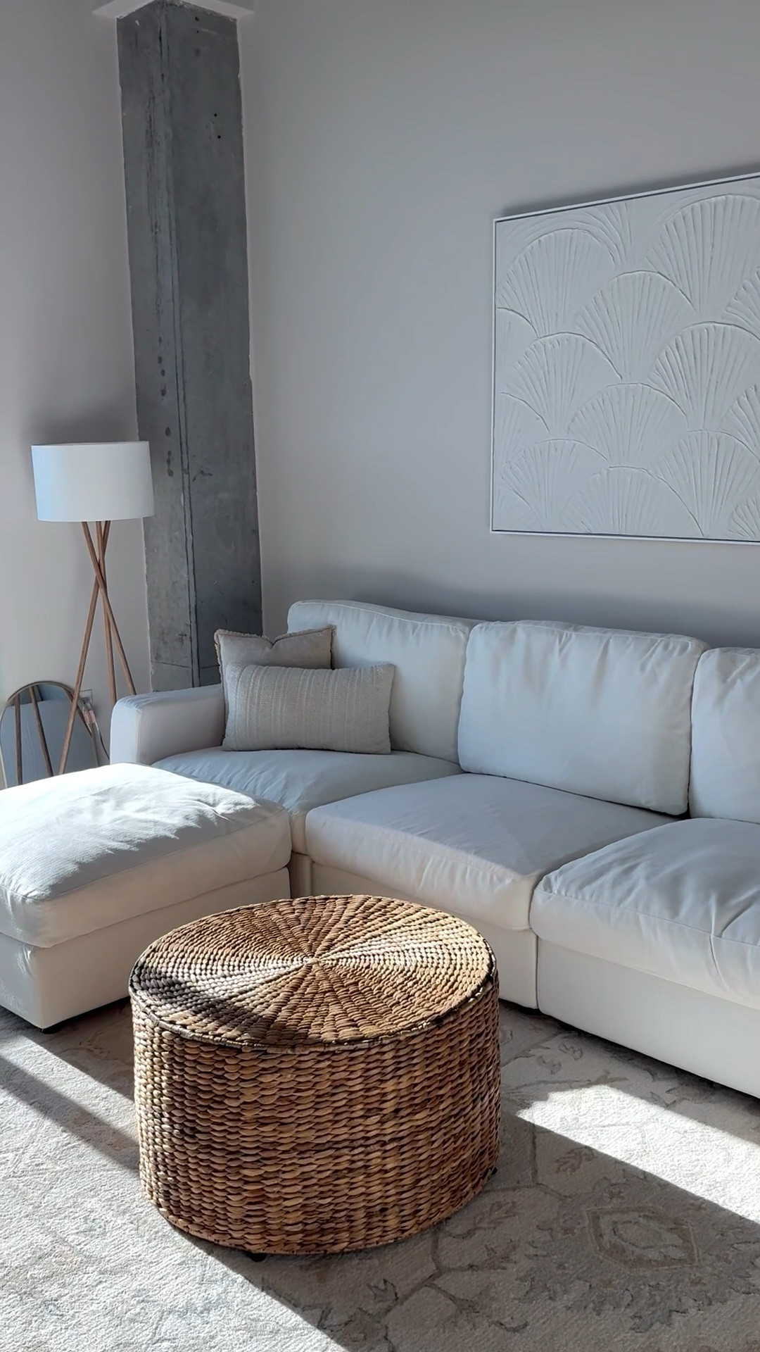 Neutral living room 🤍 Everything feels so light, cozy, and effortlessly elevated. My couch is from Amazon (so easy to put together 🙌), paired with a soft neutral rug from Wayfair that ties the whole space together. Added shell art, plus a neutral TV console and sconces to keep it clean but still elevated.

#LTKvlog #LTKHome