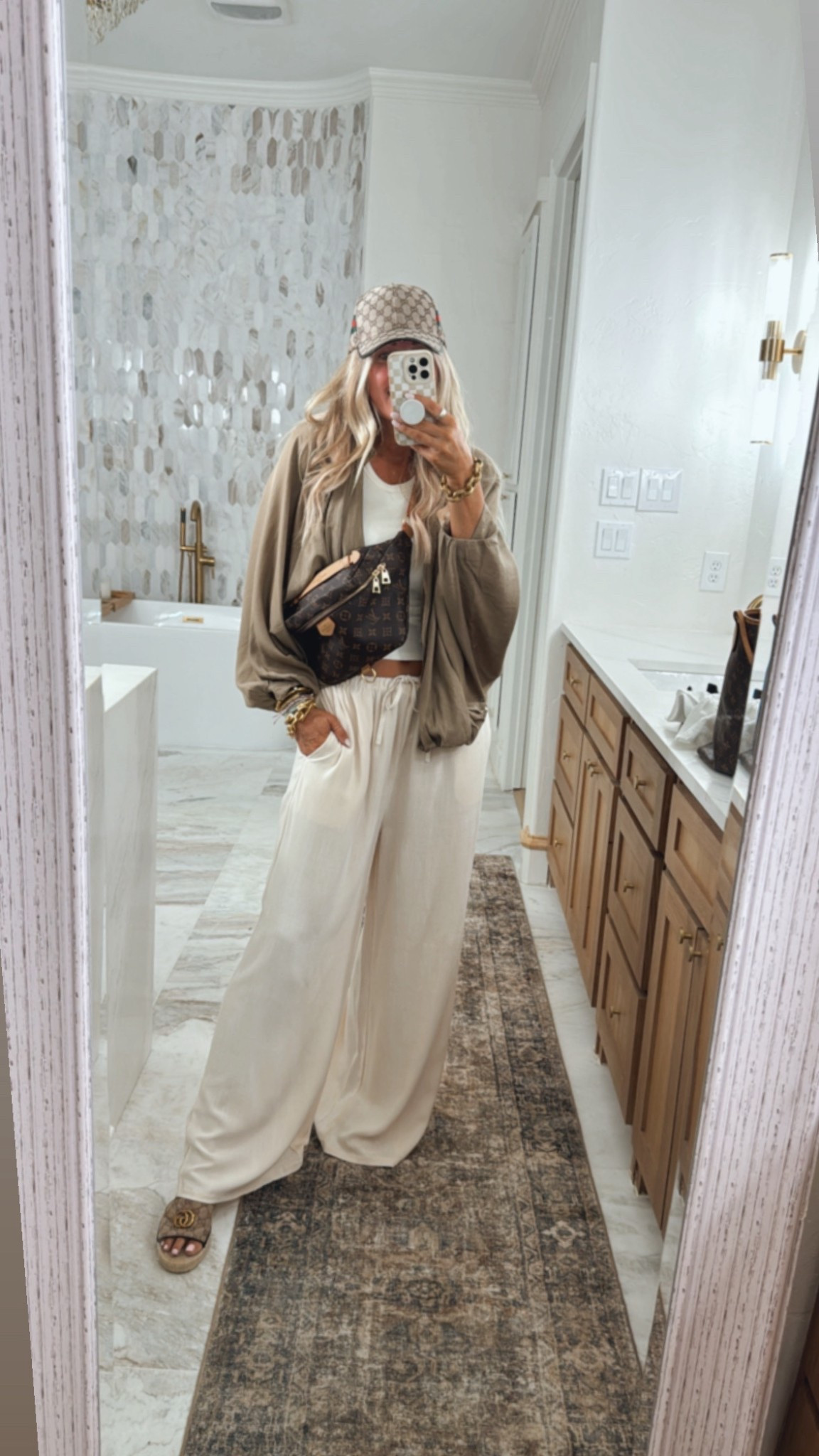 Sized up to a large in the built in shelf bra tank top and linen pants for this comfy looser fit. Sized up to large in bubble jacket. Zara looks for less. Prime day deals. Socks. Amazon. Hanes tank tops. Summer dress. Workwear. Teacher. Back to school  Prime day. Sale. Prime day deals. Country concert outfit. Sandals. Linen pants. Lake must have. Boat trip. The best radio I’ve traveled on several trips with and is waterproof. . Swimsuit fits true to size. Free people looks for less set fits true to size, wearing medium. Travel outfit. Girls trip. 
Vacation outfits. Butter yellow. Date night outfit. Linen pants sized up to large. Date night. American flag sweater. July 4th outfit. 4th of July. Vacation outfit. Butter yellow. Outfit fits true to size, but I Sized up to large in tee and boxer shorts for this oversized fit. Swimsuit. Bikini. Coverup. Linen pants. Sized up to a large in the top and sweatpants for this fit. Summer outfits. Sandals. . Swimsuit. Travel outfit. Resort wear. Maxi dress. Spring wedding guest dress. Wedding guest dress 2025. Graduation outfit. Workwear. Cardigan. Maxi dress. Resort wear. Date night. Spring 2025. Activewear all fits true to size. The loose free people looks for less top sized up 2 sizes to XL for that very oversized fit. Butter yellow. Weighted vest. Workout outfit. Sports bras fit tts. Nike shoes perfect to workout. A few spring favorites and things I don’t regret buying. Spring fashion. Daily deal. Beauty. Travel. Adidas sambas. Adidas. 

#LTKOver40 #LTKTravel