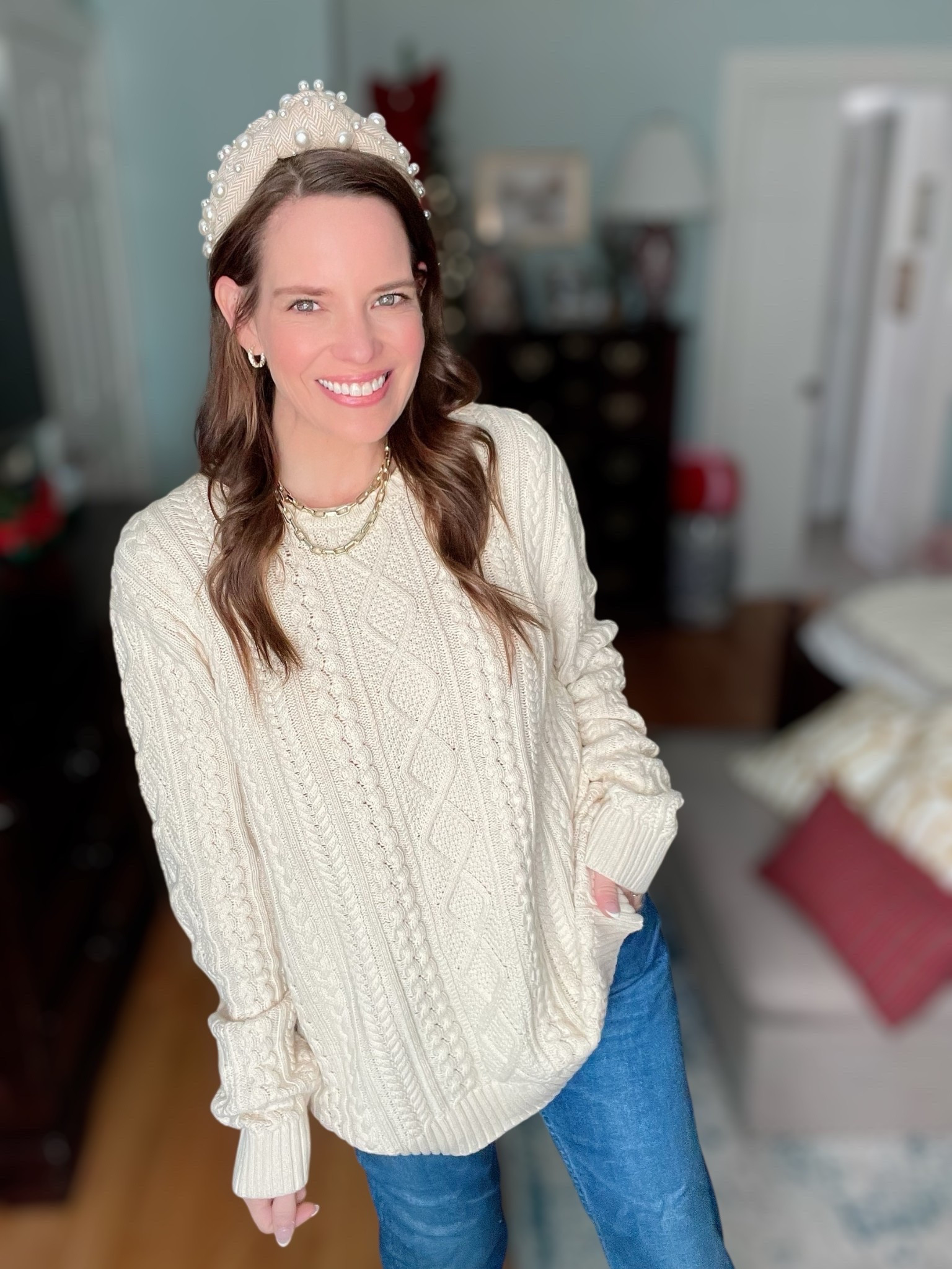 Cream Cable Knit Sweater & Classic Denim Outfit 🤍✨

This is one of those timeless outfits that never goes out of style — cozy, polished, and effortlessly chic 🤍 I love a textured cream cable knit paired with great-fitting denim for an easy everyday look that still feels elevated. The sweater has that relaxed, slightly oversized fit that works beautifully front-tucked or worn loose, making it a go-to for casual days when you still want to look put together.

I styled it with cropped straight-leg jeans and finished the look with neutral flats for comfort, but it works just as well with heels or loafers depending on the occasion. The pearl headband adds a feminine, preppy touch, and layered gold jewelry brings in a little warmth and polish. This is the kind of outfit that’s perfect for brunch, errands, casual meetings, or weekend plans when you want something classic and comfortable that still feels styled ✨

Cream sweater outfit, cable knit sweater look, classic denim outfit, everyday neutral outfit, pearl headband style, layered gold jewelry, chic casual outfit, cozy winter sweater, Amazon sweater find, polished everyday look

#LTKGiftGuide #LTKFindsUnder50 #LTKFindsUnder100