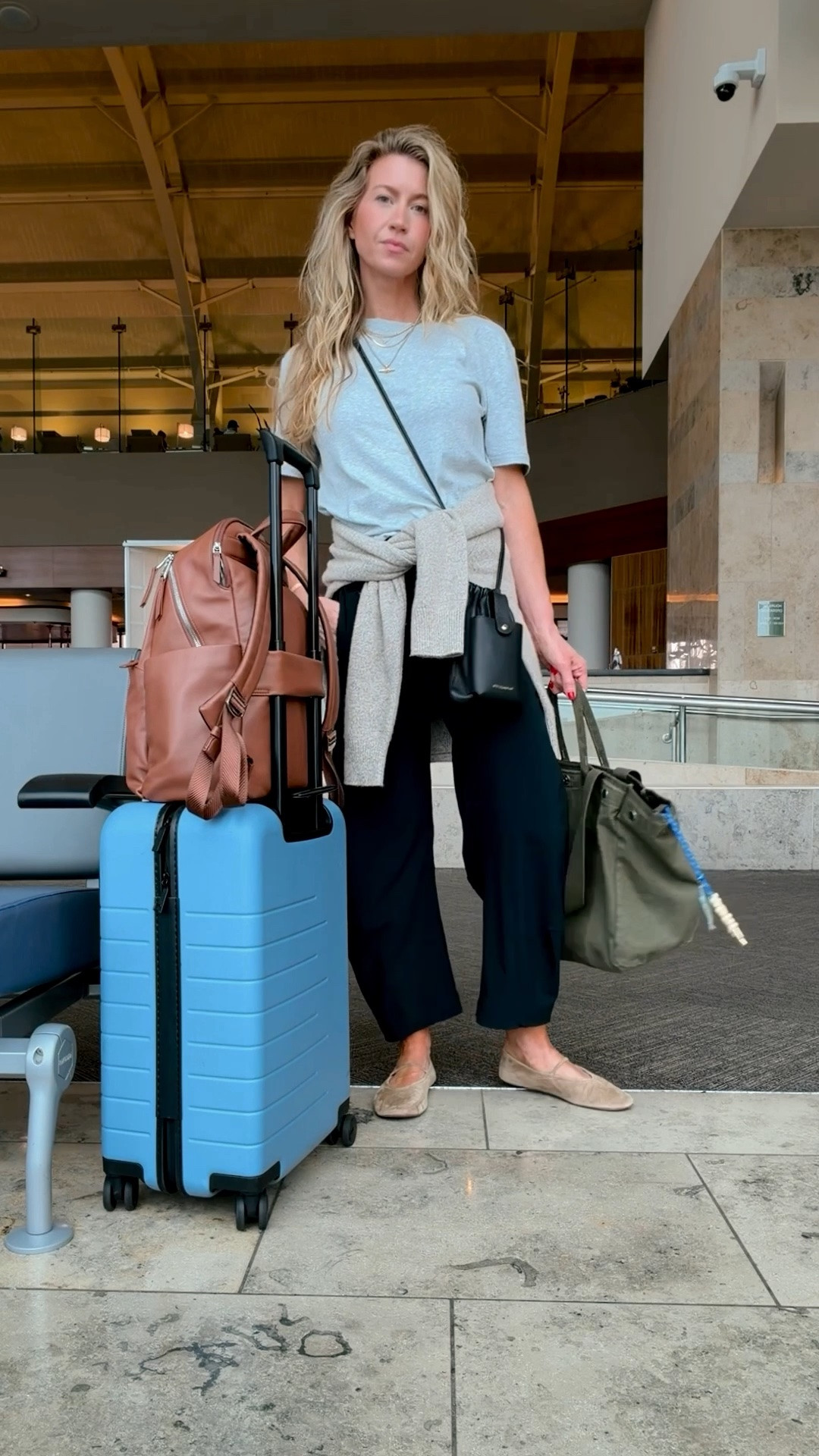 Comfy airport travel outfit from this weekend. 

Cashmere sweater: run slightly oversized, wearing a S
Black Ruti pants: unfortunately, they are as amazing as they look, run TTS, wearing a 2
Grey T-shirt: so soft and luxe, happy this is back in stock! Runs slightly oversized, wearing a S.

#LTKTravel #LTKootd #LTKmomlife