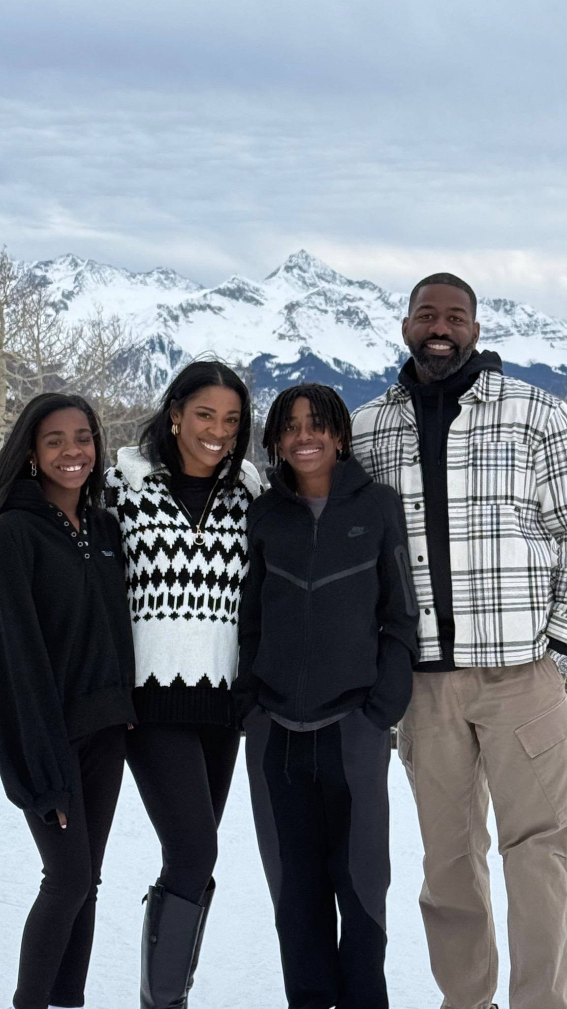 Casual family winter photo in the mountains before dinner. Plaid, fair isle and winter mountains. Warm casual winter mountain town vibes. Not super matchy just everyone in an outfit they love #ltkfamily #winteroutfits

#LTKTravel