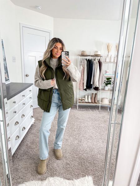 Ten ways to style this green puffer vest from Amazon 🫶🏼 look 6/10 
+ puffer vest: small
+ sweater: small
+ jeans: 25 short 
+ Ugg minis: size 6

#LTKSeasonal #LTKfindsunder100 #LTKfindsunder50