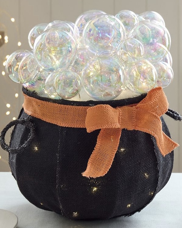 Brew up some Halloween magic with this Light-Up Bubbling Cauldron Decor! 🧙‍♀️✨ Perfect for porches, entryways, or spooky tabletops, this festive piece brings eerie charm to your haunted setup. Crafted from vine, wire, and fabric, it’s designed to impress with a delightfully spooky bubbling effect, lit by 50 glowing LED bulbs.

Battery-operated and it features a convenient on/off switch with a built-in timer. Set it and forget it while it adds the perfect glow to your Halloween night.

#LTKHome #LTKSeasonal #LTKKids