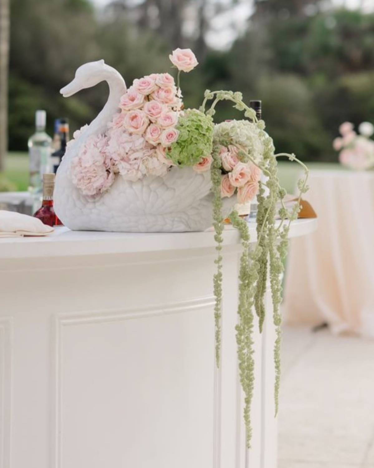 These swan planters would be gorgeous with an arrangement on the bar at your wedding!!!  

 #LTKWedding