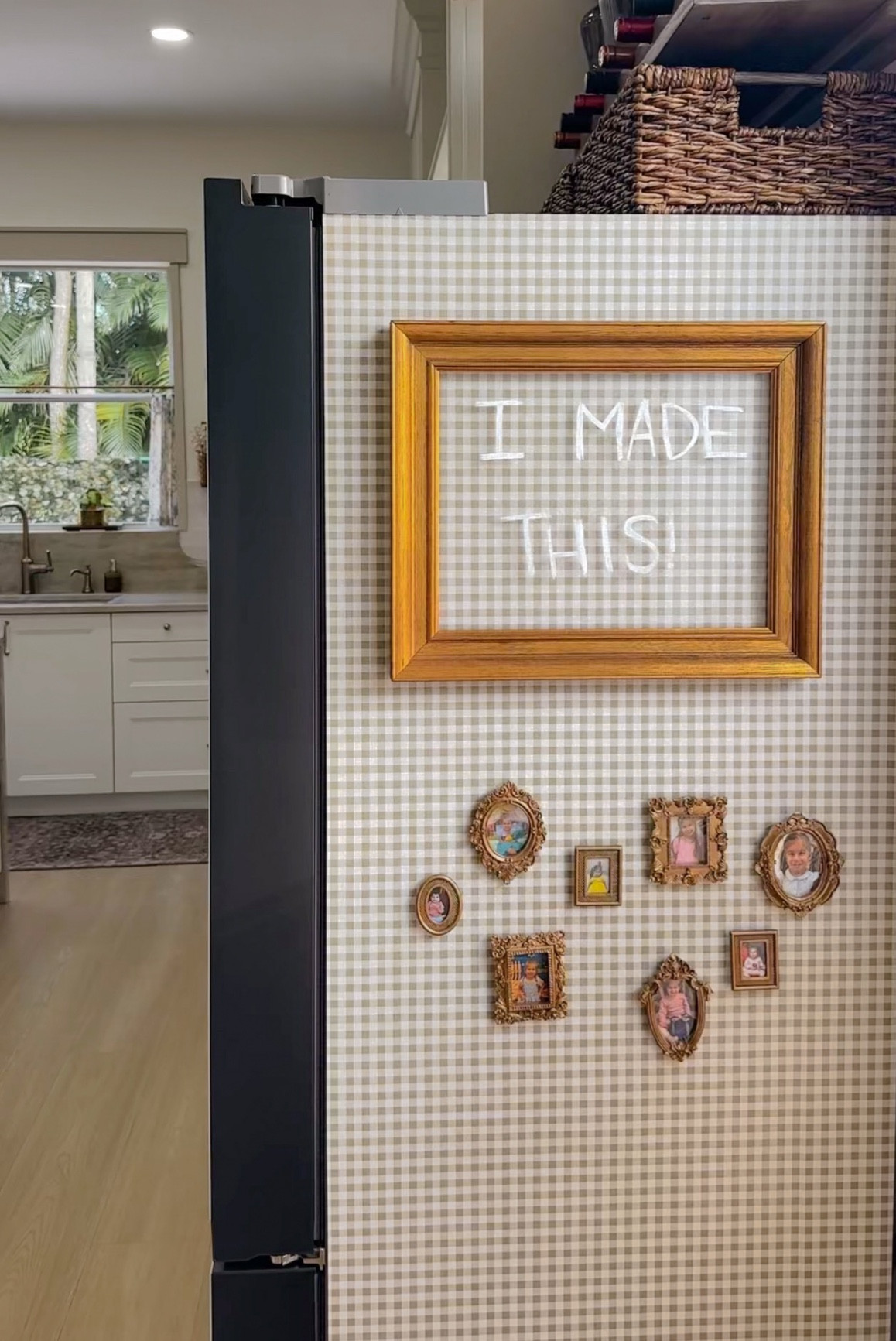 Giving my fridge a glow up ✨ Wallpaper, framed photo magnets, and a DIY acrylic notes board turned this little eyesore into something cute and practical 🤎 Linking everything here!