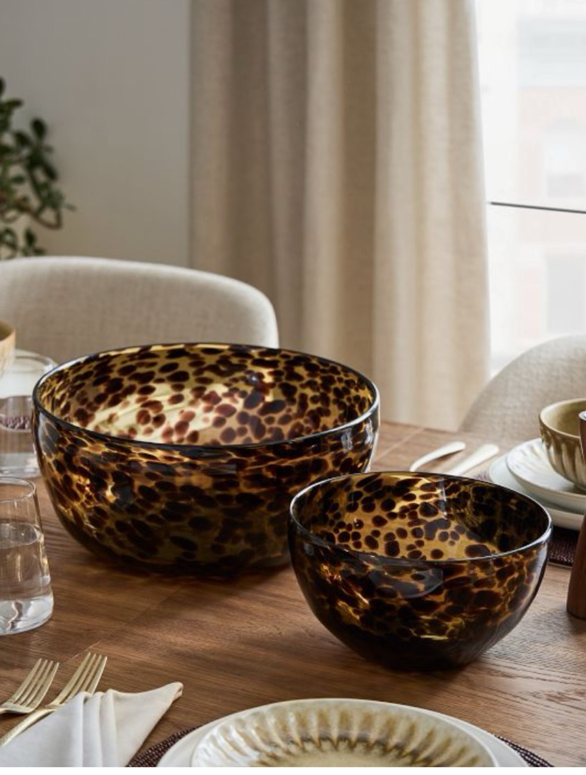 ON CLEARANCE!! Beautiful tortoise glass bowls! Love these in the dining room, prop one on some stacked books, for lemons by the bar. 
Tortoise Glass Bowl. Classic. Timeless. Kitchen. Living Room. Moody. Traditional. Entertaining. Bar Area.

#LTKhome #LTKsalealert #LTKfindsunder50