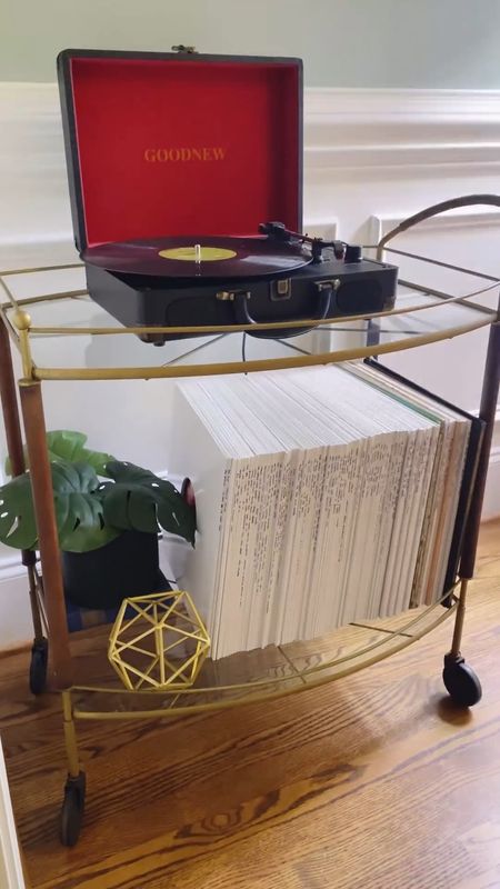 🚨Buying NEW furniture is no where near as cool…🤫👇

…as finding a glorious antique! 

Who needs brand new furniture when you can turn heads with statement-making vintage pieces? 

This 1960s vintage bar cart, a gem found at the thrift store, now serves as the perfect record player stand and vinyl storage in my dining room. 

Guess what? I found this exact 1960s bar cart online for sale and other bar carts at other prices points that are vintage or look vintage based on your budget! 

#barcart #recordplayer #recordstorage #vintagestyle #vintagedecor #vintagebarcart #1960s 

#LTKsalealert #LTKfindsunder100 #LTKhome