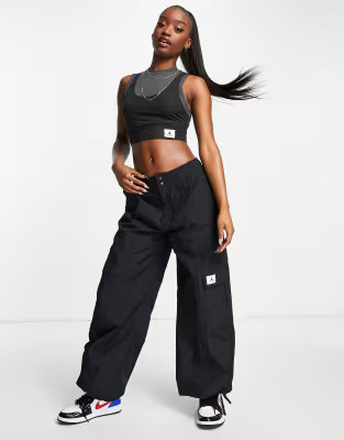Jordan essential parachute cargo pants in black | ASOS | ASOS (Global)