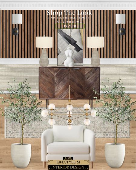 Mid century modern foyer design. Dark wood console table, white upholstered accent chair, white tree planter pot, faux olive tree, beige traditional runner rug, beige white table lamp, black white modern wall art, black wall sconce, brass bubble modern chandelier.

#LTKhome #LTKFind #LTKstyletip