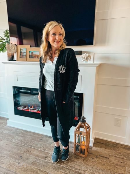The other day, I asked if you had a “uniform” or go-to outfit that you go to when you are hanging around the house. 

Mine is usually joggers and a T-shirt, and I always have my open monogrammed cardigan in hand reach! These Cardigans from Marleylilly are so soft. I have one in black and tan! 

Everyday outfit 
Casual outfit 
Nike running shoes 
Black joggers 
Wood floor lantern 

#LTKstyletip #LTKfindsunder50 #LTKover40