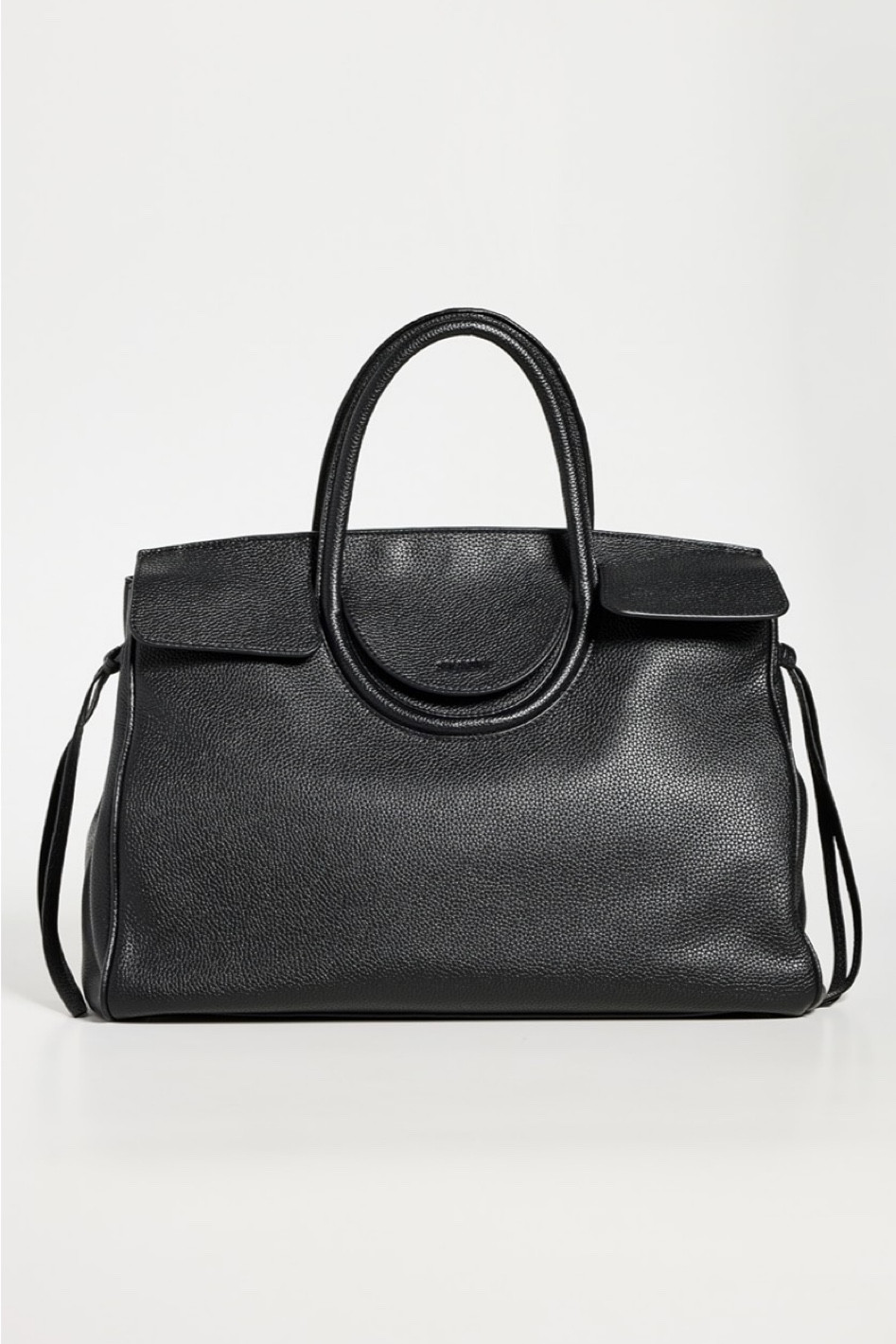 Adore this bag and eyeing for myself this spring. The perfect work size bag and love the flap for easy travel/security. Staud can do no wrong  

#LTKItBag