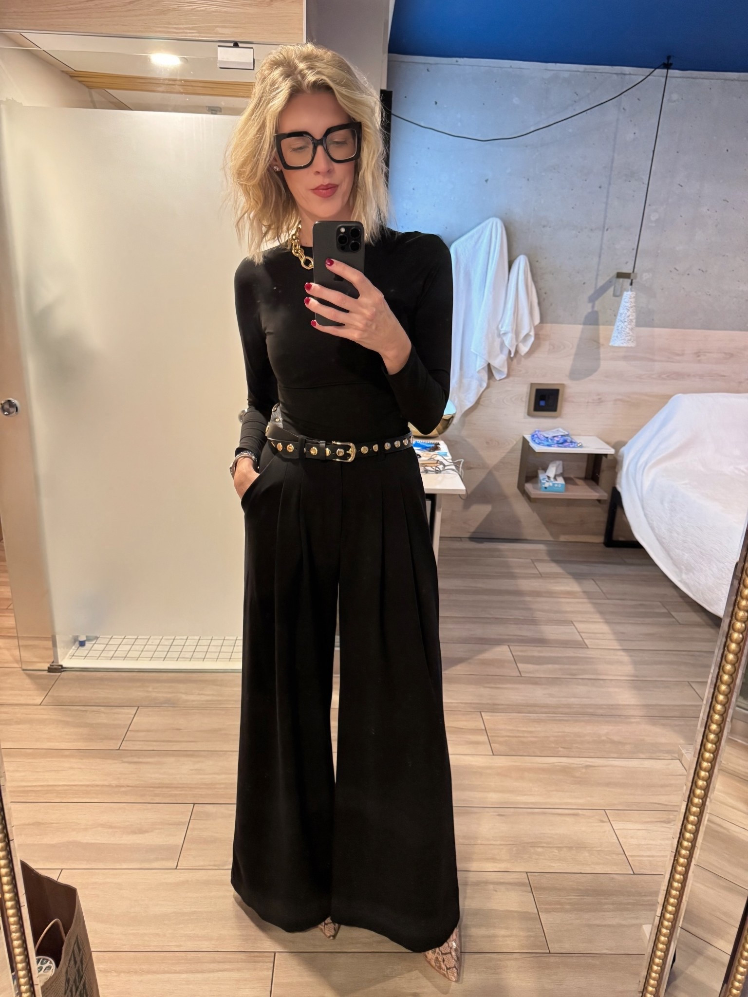 ALL BLACK EVERYTHING (because my heart matches my outfit) 🖤

Corporate goth? Office villain? CMO who means business? Yes to all of the above.

This Amazon top has been working overtime lately doing the lord’s work (size small). But let’s talk about THE PANTS. 

The Avery Wide Leg from Anthropologie are genuinely the greatest pants ever created by mankind. I sized DOWN to 4T because they run large, and I have them in basically every color. They’re giving “I run this meeting” energy.

The belt? Amazon designer dupe because we’re smart AND stylish. 

ZEELOOL prescription glasses because I need to actually SEE the spreadsheets I’m pretending to read. And these heels? 👩‍🍳 💋 - making the walk from my car to my office feel like a runway.

Shop this look before I buy every pair of these pants in existence and you’re left with nothing but regret and inferior trousers. You’re welcome.

🔗 Link in bio to steal my entire personality via clothing. 

#LTKWorkwear #LTKTall #LTKootd