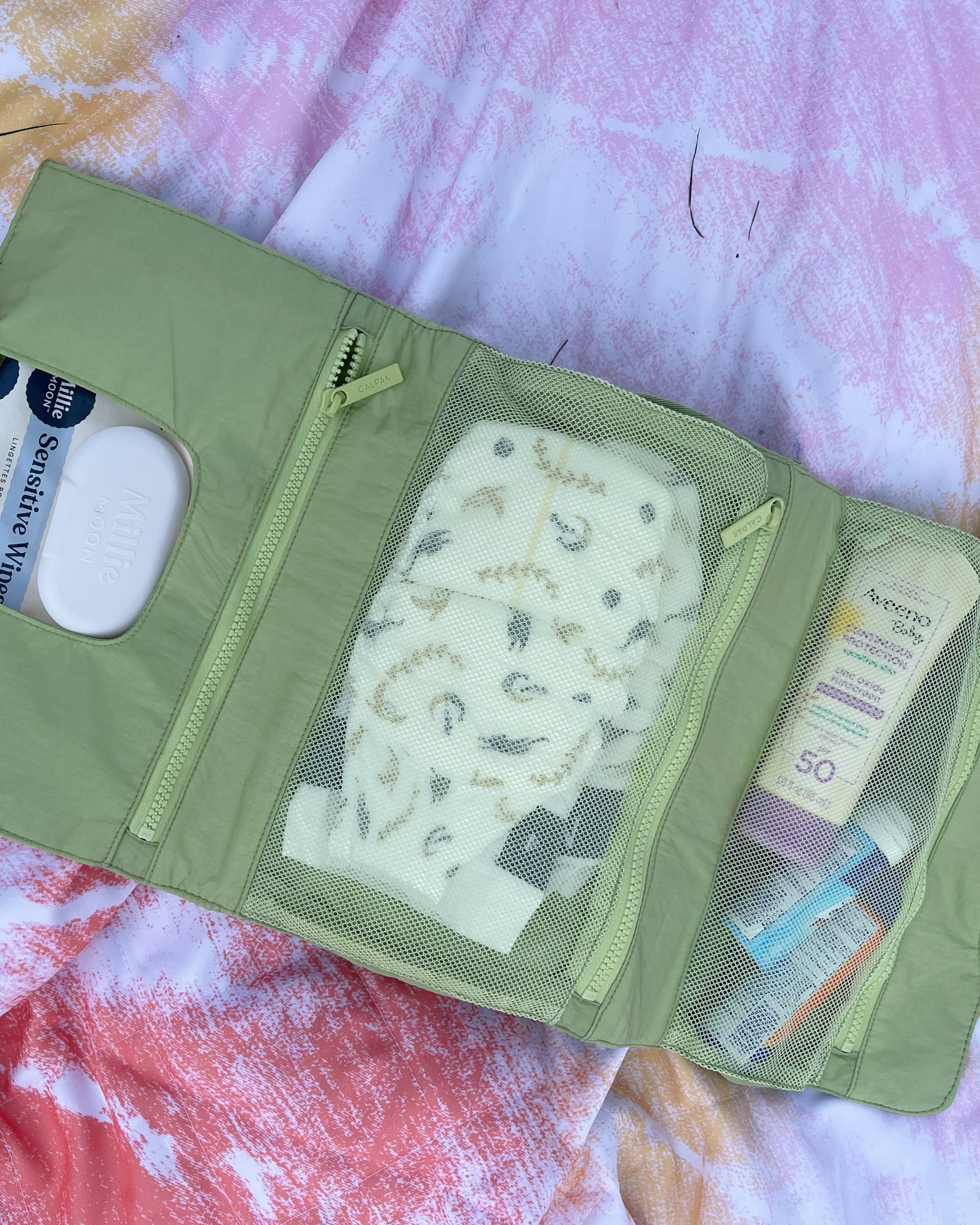  A summer must have! Compact and portable changing pad 💚 #babymusthave #calpaktravel 

#LTKFamily #LTKBaby #LTKKids