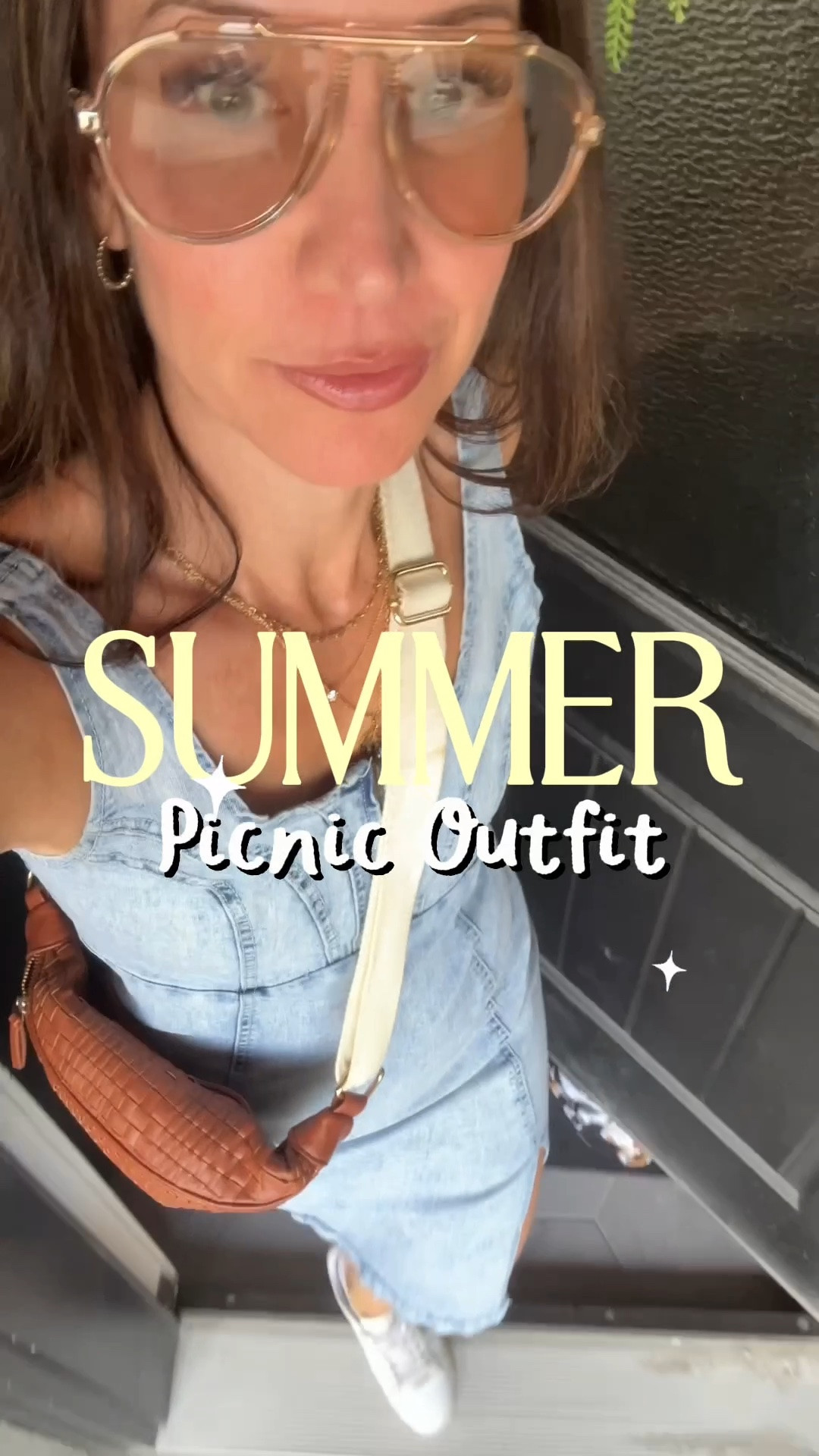 This denim dress is a classic piece to add in your closet. Pair it with a light sweater for the evening, some white tennis shoes and a cute pouch purse. #picnicoutfit #carnivaloutfit #summeroutfit #denim

#LTKootd #LTKOver40
