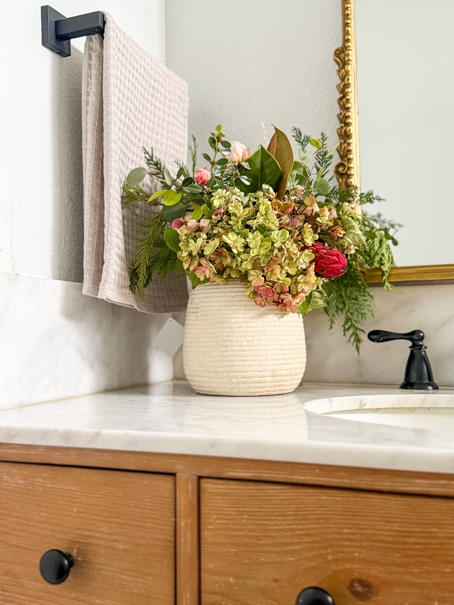 This gorgeous bathroom vanity from @wayfair is perfect for my guest bathroom! I accessorized it with a ceramic vase filled with fresh flowers from my garden and a lovely modern neutral hand towel! ❤️ #ad #newyearnewyou #wayfair #wayfairpartner 

#LTKBeauty #LTKHome #LTKSaleAlert