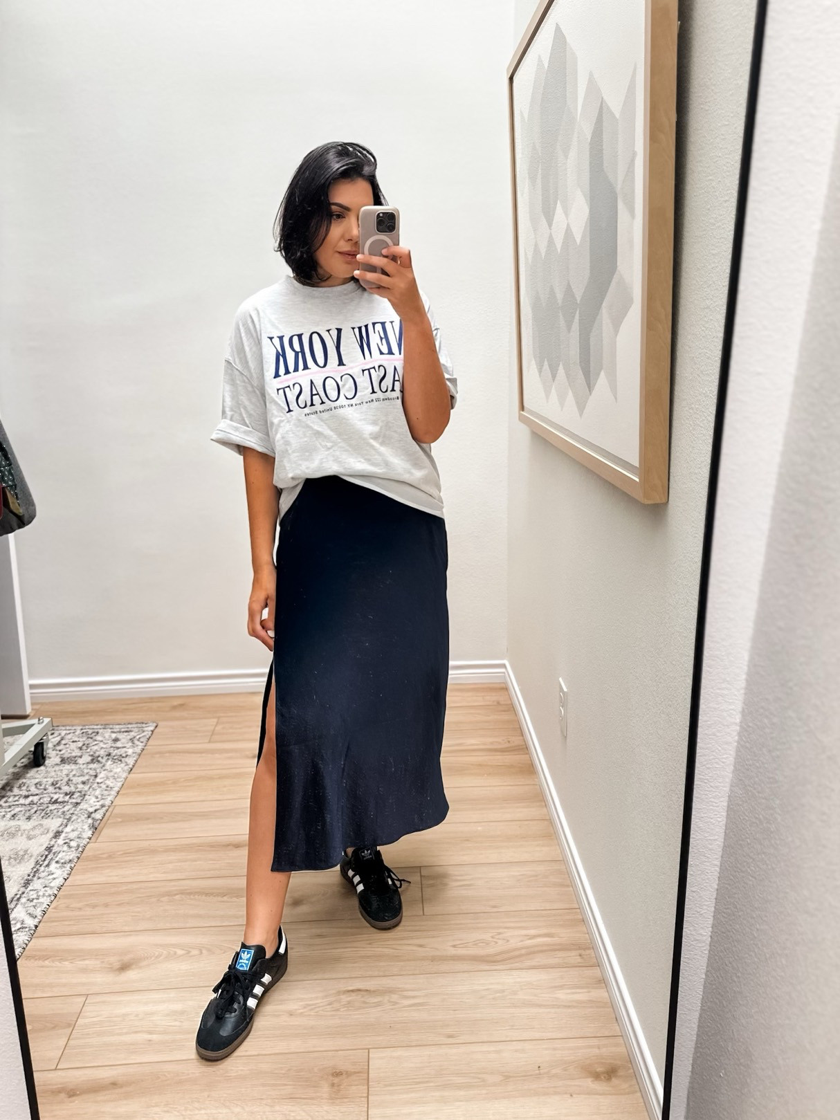 I’ve been trying to find an oversized tee to wear with a skirt and sneakers like this and I’m trying to decide If this is the one. It’s very boxy , so I  can’t tell but overall I like the vibe and the fabric. It’s a thicker cotton, holds its shape. I am in the large, fit is oversized but not super long.

I'm in the 8 of the skirt.  

 #LTKFindsUnder100