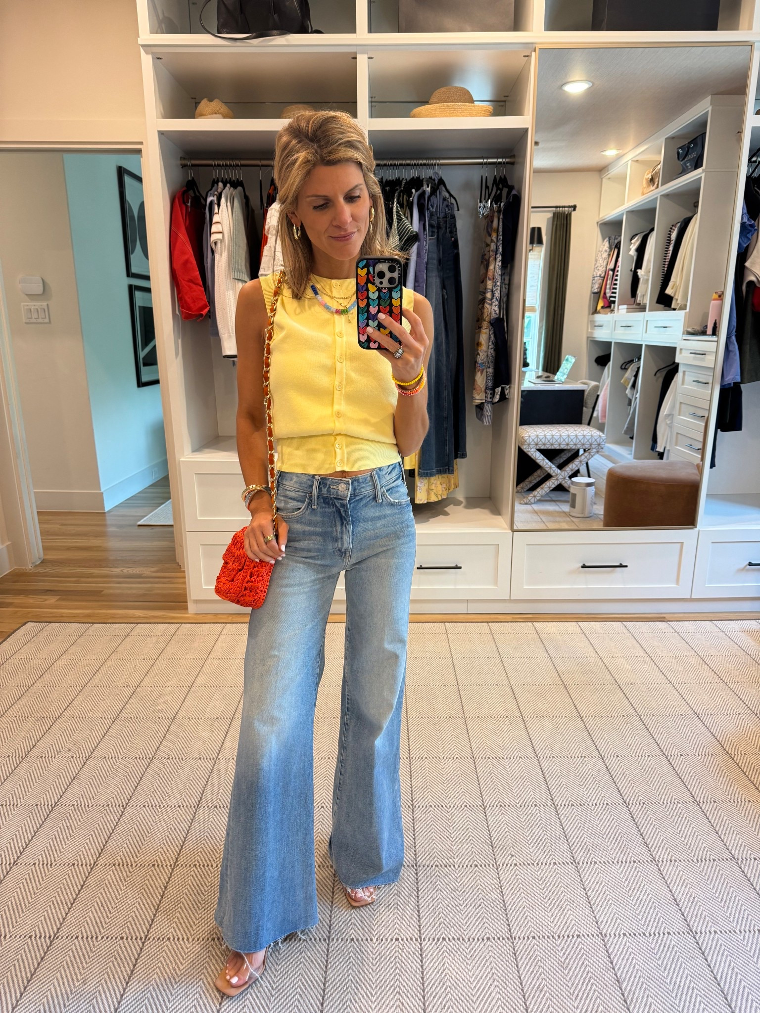 Shirt: Nordstrom ASTR (wearing XS)
Jeans: Nordstrom MOTHER (TTS) 
Jewelry: Amazon, Diamonds Direct
Bag: Caterina Bertini (linking red style in stock and and an orange similar) 
Shoes: Old Shutz (linking updated style)
