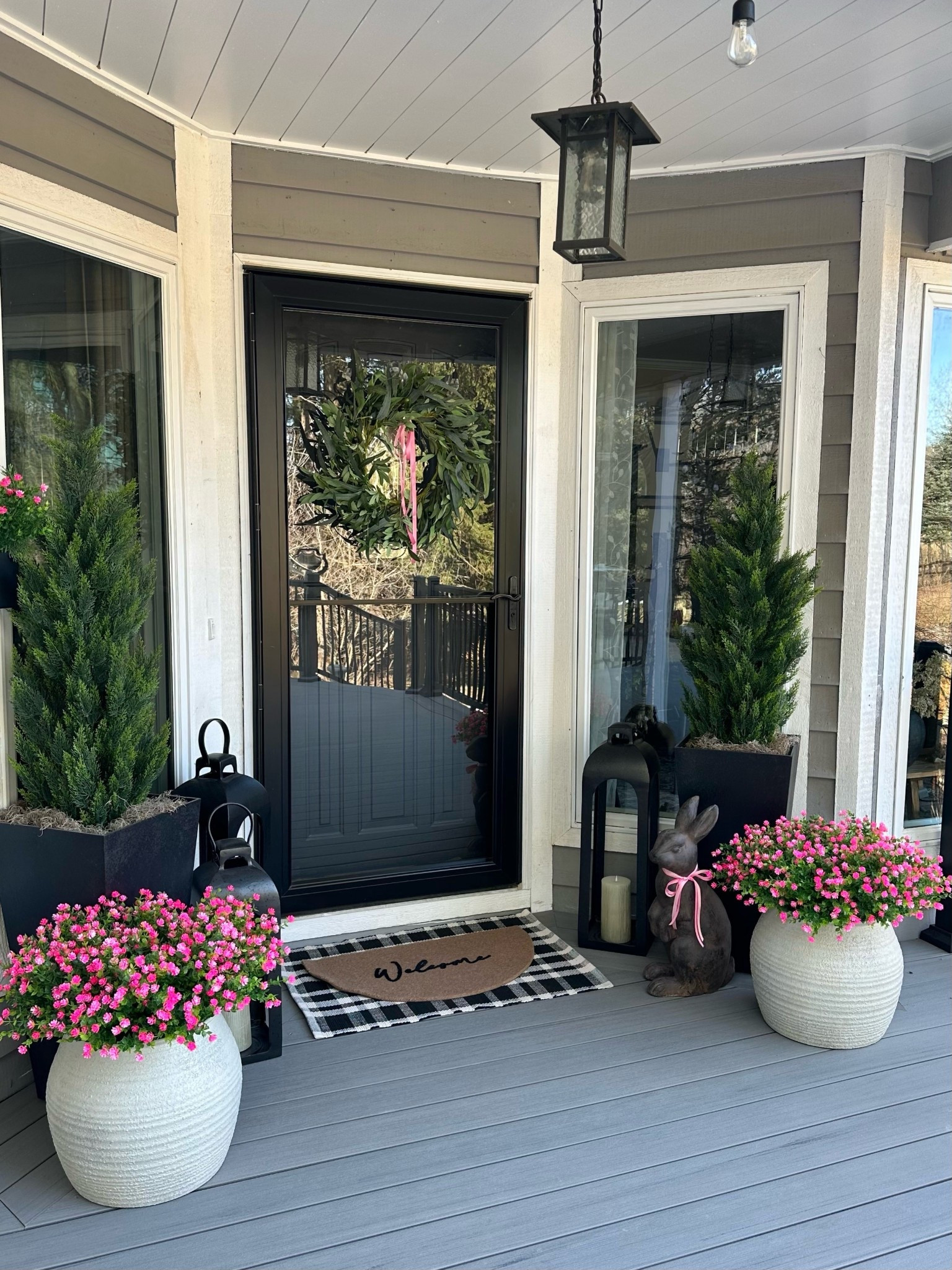 Spring Front Porch Decor with Lanterns, Bunny Statue + Pink Florals

Follow @farmtotablecreations on Instagram for more cozy home styling and seasonal finds.

This spring porch setup is the sweetest little welcome home moment 🌸 The layered entry rugs add the perfect touch of texture, and I love how the tall lanterns + evergreen planters create that clean, symmetrical look. The pink florals bring in just the right pop of spring color, and the bunny statue is such a fun seasonal accent without feeling overdone.

These plastic, UV resistant flowers come 10 bundles per box and I used 3 boxes (30 bundles total) in my 14” pot— and as you can see, they look incredibly full and realistic. Such an easy way to get that fresh spring look with zero upkeep.

Everything is simple, neutral, and easy to recreate for an inviting front porch refresh!

#springdecor #frontporchdecor #outdoordecor #porchstyling #entrywaydecor #lanterns #planters #doormat #springporch #seasonaldecor


#LTKSaleAlert #LTKHome #LTKSeasonal