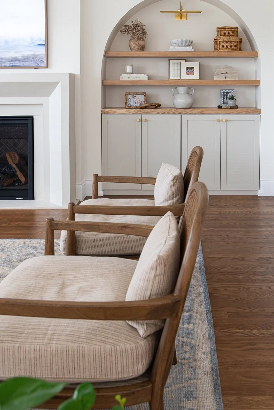 These Pottery Barn accent chairs are a recent favorite furniture find of mine. The warm wood against the light cushions is just perfect!

#LTKHome