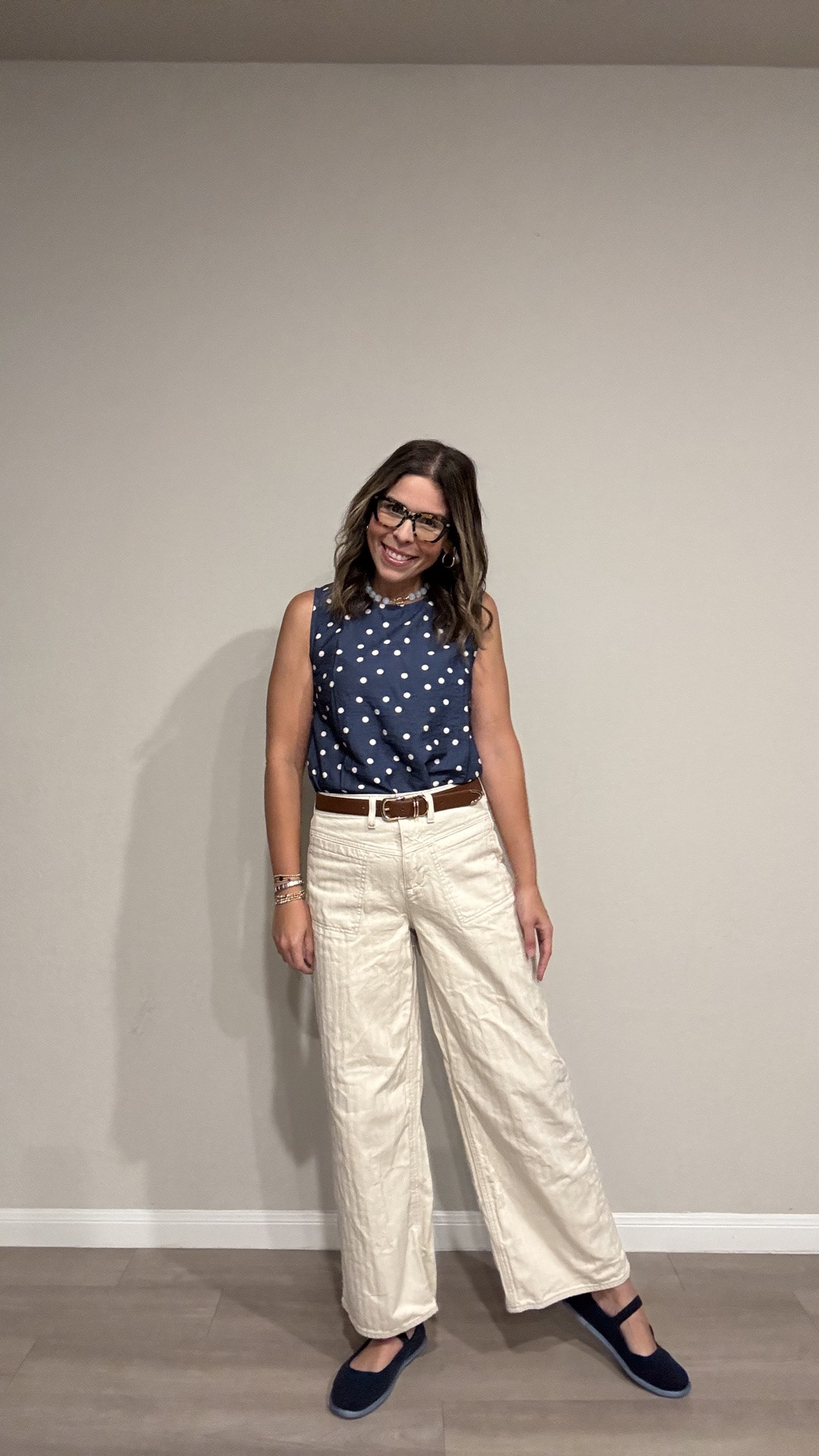 Loving how crisp and clean this combo feels—the navy polka dot top paired with cream wide-leg pants is such a timeless pairing. Added a brown belt to define the waist and kept the shoes simple with navy loafers. Pearls + glasses = instant classic vibes. This outfit works for everything from casual Fridays to weekend errands!

#LTKootd #LTKMidsize #LTKWorkwear