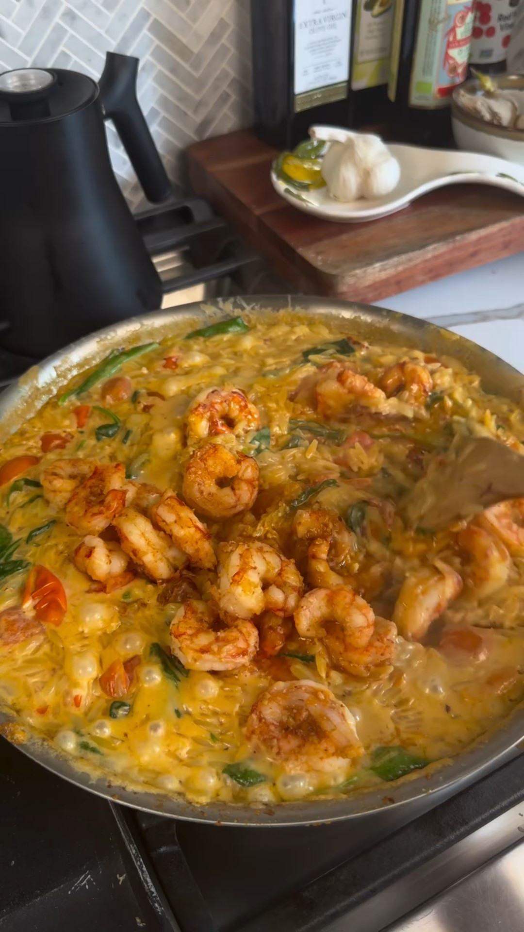 Creamy shrimp orzo ✨ 

Follow @fridasofiaeats + comment “Recipe” and I’ll send you the full recipe 👩🏼‍🍳 

I somehow always keep orzo in the pantry so this dish can easily be whipped up if you grab some shrimp from the grocery store! It’s so creamy and feels fancy but easy enough to make for a weeknight 🥘 skip on the red crushed peppers if you don’t like spicy 🌶️ 

1 lbs shrimp
Olive oil
1 tbsp butter
1 tsp salt
1 tsp garlic seasoning
1/2 red crushed pepper
1 yellow onion, diced
12 oz cherry tomatoes
3 tbsp sun-dried tomatoes
1 cup heavy cream or coconut milk
3 cups chicken broth
2 cups dry orzo 
1/4 cup grated parmesan cheese 🧀 
2 cups spinach 

1. Add olive oil to a large pan, medium heat, and let it heat up. Add shrimp, season with salt, garlic seasoning and crushed red pepper, and let cook for a few minutes each side until golden and mostly cooked through. Remove from pan and set aside.

2. Add some more olive oil to pan, add diced onion and sauté for 2-3 minutes before adding cherry tomatoes. Cook for 5 minutes until bursting and until they starten to soft. Add sun-dried tomatoes and stir. Crush tomatoes lightly by pressing down on them.

3. Add orzo to pan, along with cream and broth. Stir everything, add parmesan cheese and continue to stir. Cook for about 10 minutes until the orzo is cooked and most of the liquid has been absorbed. Stir often so that the dish doesn’t burn. 

4. Once most of the liquid has been absorbed, add spinach, and stir in. Once wilted, remove from heat and serve with parmesan.