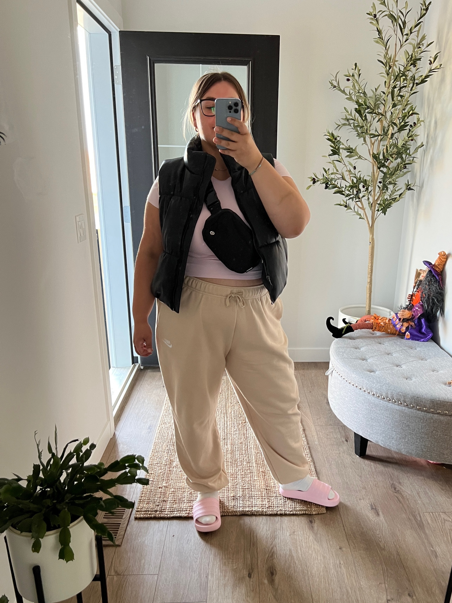 Comfy casual in Nike sweatpants, lululemon belt bag, lululemon nulu top, puffer vest and adidas sandals 

#LTKmidsize #LTKGiftGuide #LTKSeasonal