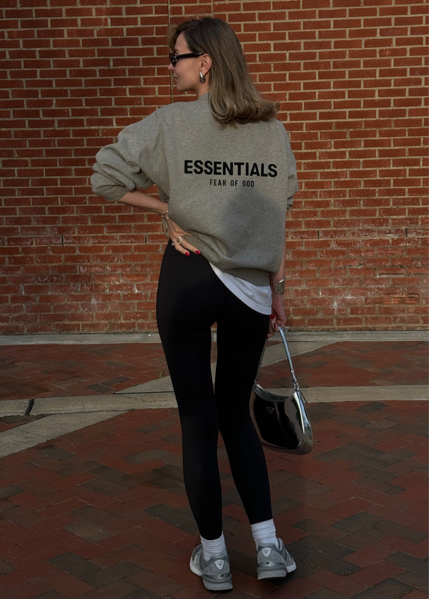 Comfy outfit  to run errands with black Lululemon leggings, New Balance shoes, Nike socks, Prada bag, Essentials sweatshirt and Amazon earrings

#LTKstyletip