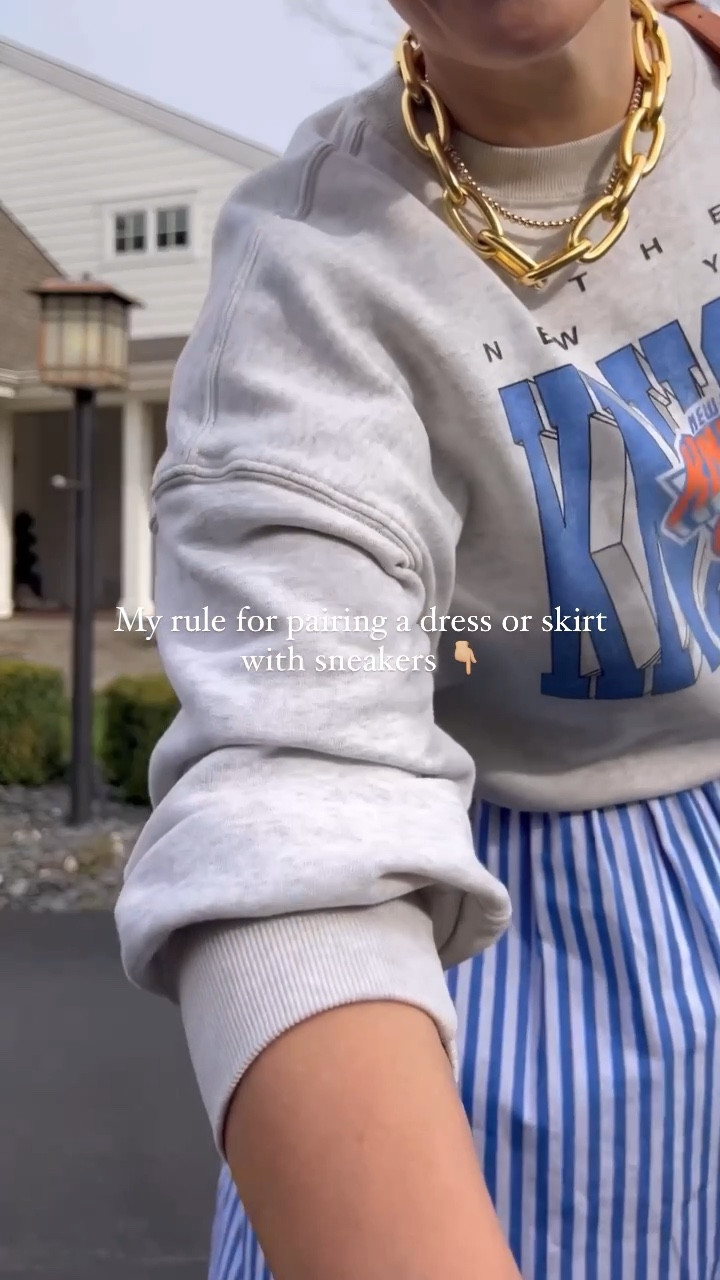 I don’t have many fashion “rules” but one I do tend to follow is when pairing a dress with sneakers - you have to show some leg! Doesn’t have to be a lot but it breaks up the look and keeps it light.

This hill house dress is a few years old and Abercrombie sweatshirt is from last year but linked similar
♥️ Claire 

#LTKVideo #LTKStyleTip #LTKSeasonal