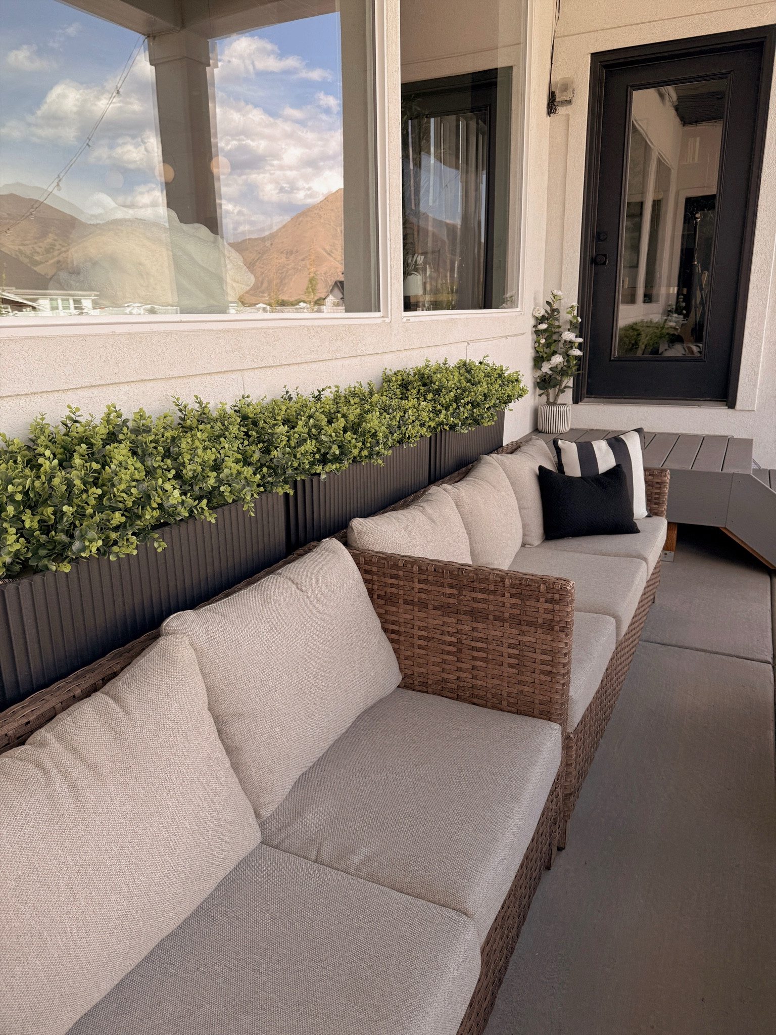 These planters completely transformed this outdoor space. Clean lines, modern style, and they make faux or real greenery look so elevated. One of my favorite patio upgrades.

#LTKSeasonal #LTKHome