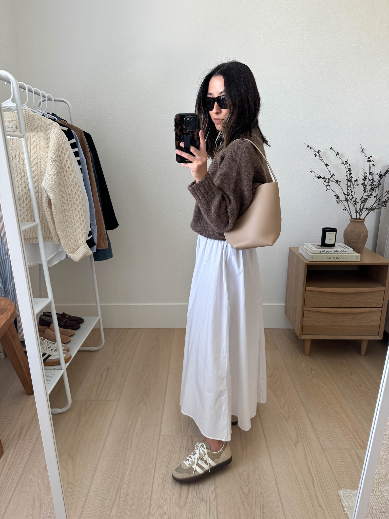 What fall bottoms work with sneakers? I love a good maxi skirt with sneakers in the fall. 
I'm not wearing socks here, but this photo is old and I'd definitely wear an ankle sock at least. 

Madewell skirt xs (old)
Jenni Kayne Sweater xs
Adidas sneakers 4 mens
The Row tote small
Celine sunglasses 

#LTKSeasonal #LTKPetite #LTKStyleTip