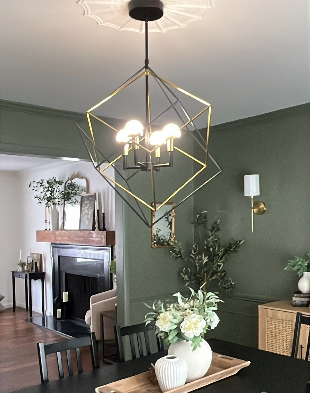 Lighting can make or break a space, and my dining room deserved better! I added this LED pendant light from Artika to upgrade my outdated light fixture 

This modern design features sleek black and gold cube details that create the perfect asymmetrical look. It’s dimmable, energy-efficient. And with a 50,000-hour lifespan

Artika Peyton 15W Integrated LED Modern Mid-Century Chandelier, Black and Gold Ideal for Dinning Room, 1500 Lumens, Tunable White 3000-4000-5000 

#LTKHome