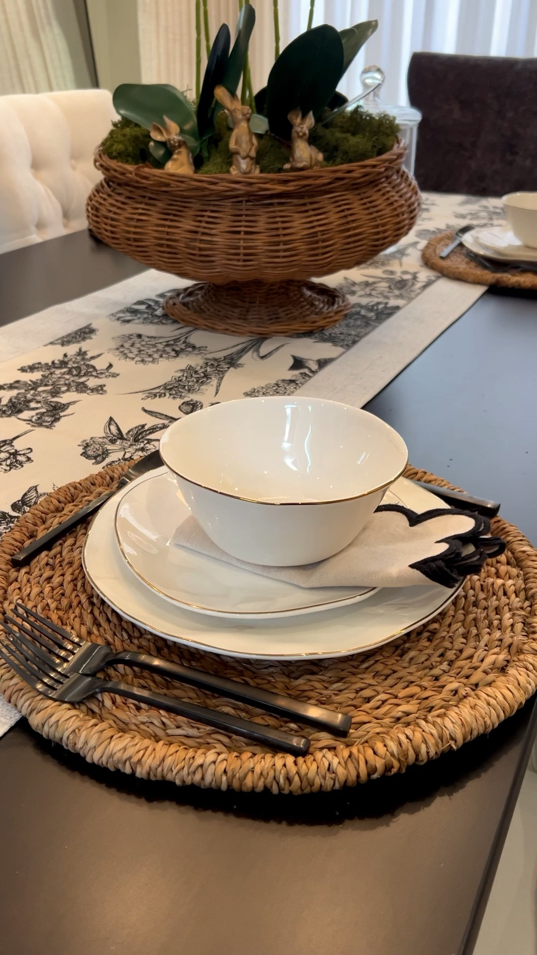 The rattan placemat completely steals the spotlight — adding warmth, texture, and that effortlessly relaxed feel. Layered with classic white dishes, sleek black flatware, and a soft neutral napkin, this setting feels equal parts cozy and elevated. Simple, modern, and quietly chic with just the right amount of contrast.

Would you set your table like this? 

#LTKHome #LTKSaleAlert #LTKSeasonal
