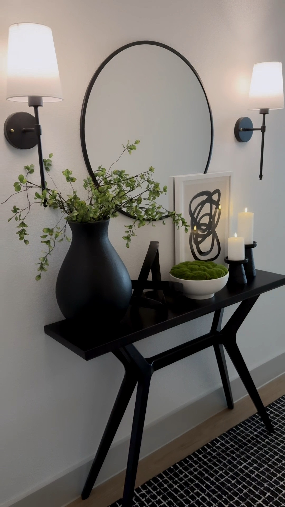 a mix of modern art, sculptural decor, candlelight, and a touch of greenery gives my entrance that effortlessly modern feel.

#LTKsummer #LTKhome #LTKluxury